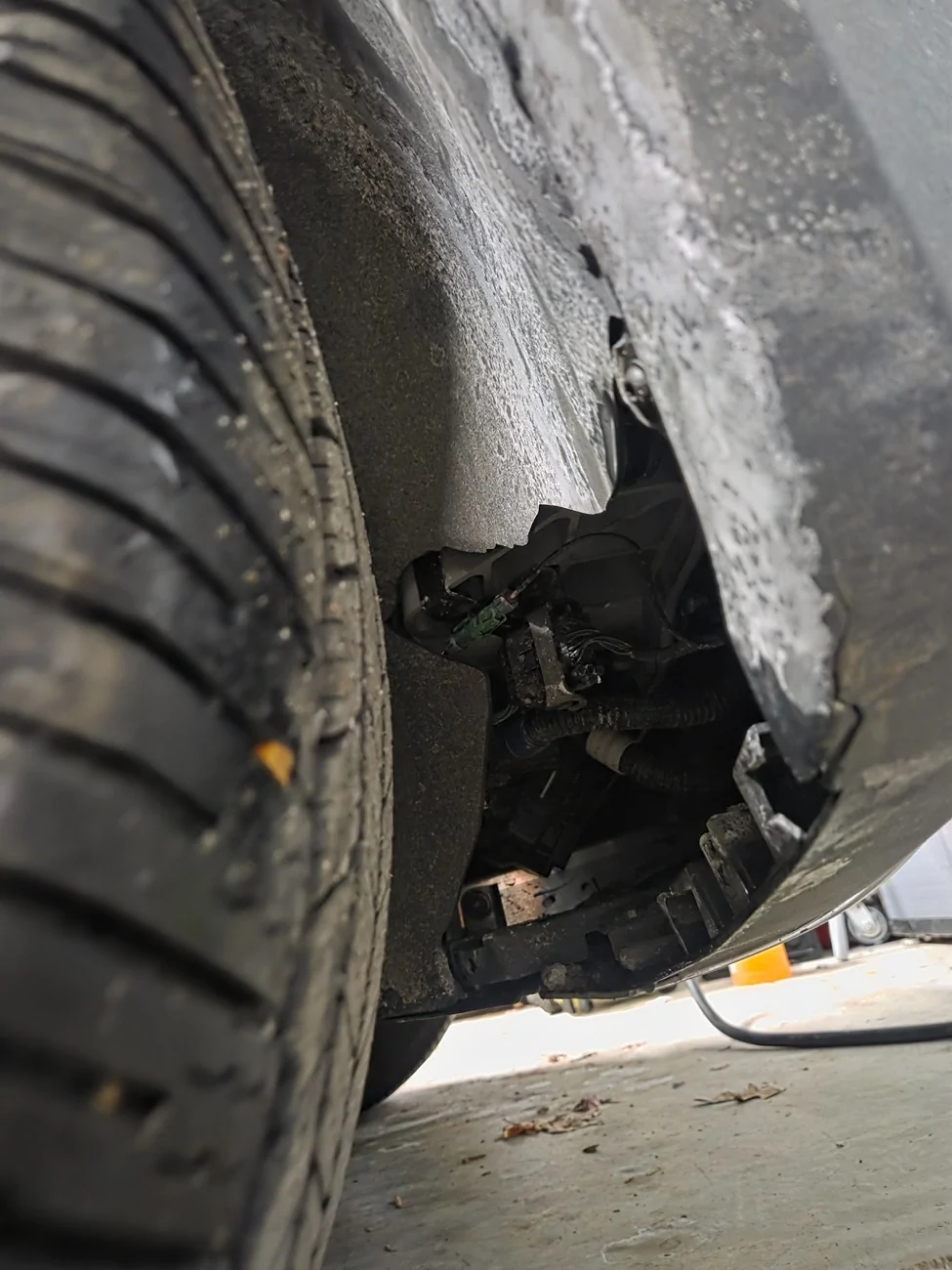 Rivian R1T R1S Ripped out front air dam 20260208_181624