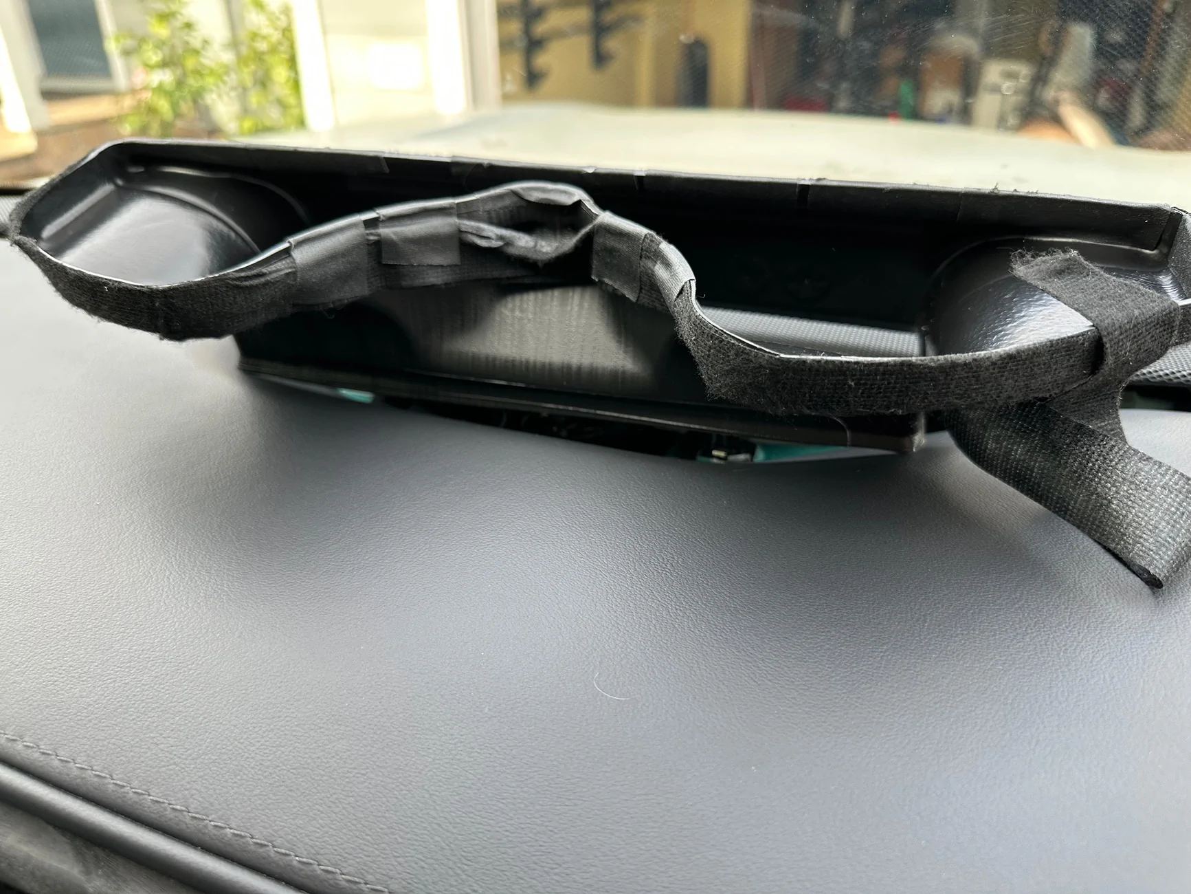 Rivian R1T R1S Fixed rattle under front dash mesh, once and for all. IMG_4681