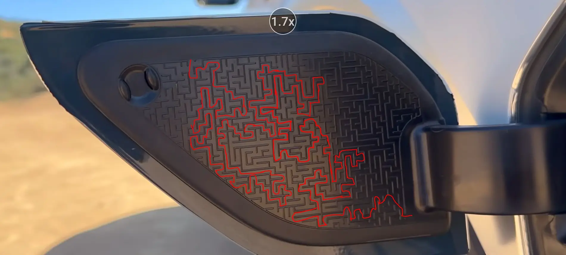 Rivian R1T R1S R2 maze puzzle on charge door 1000028225