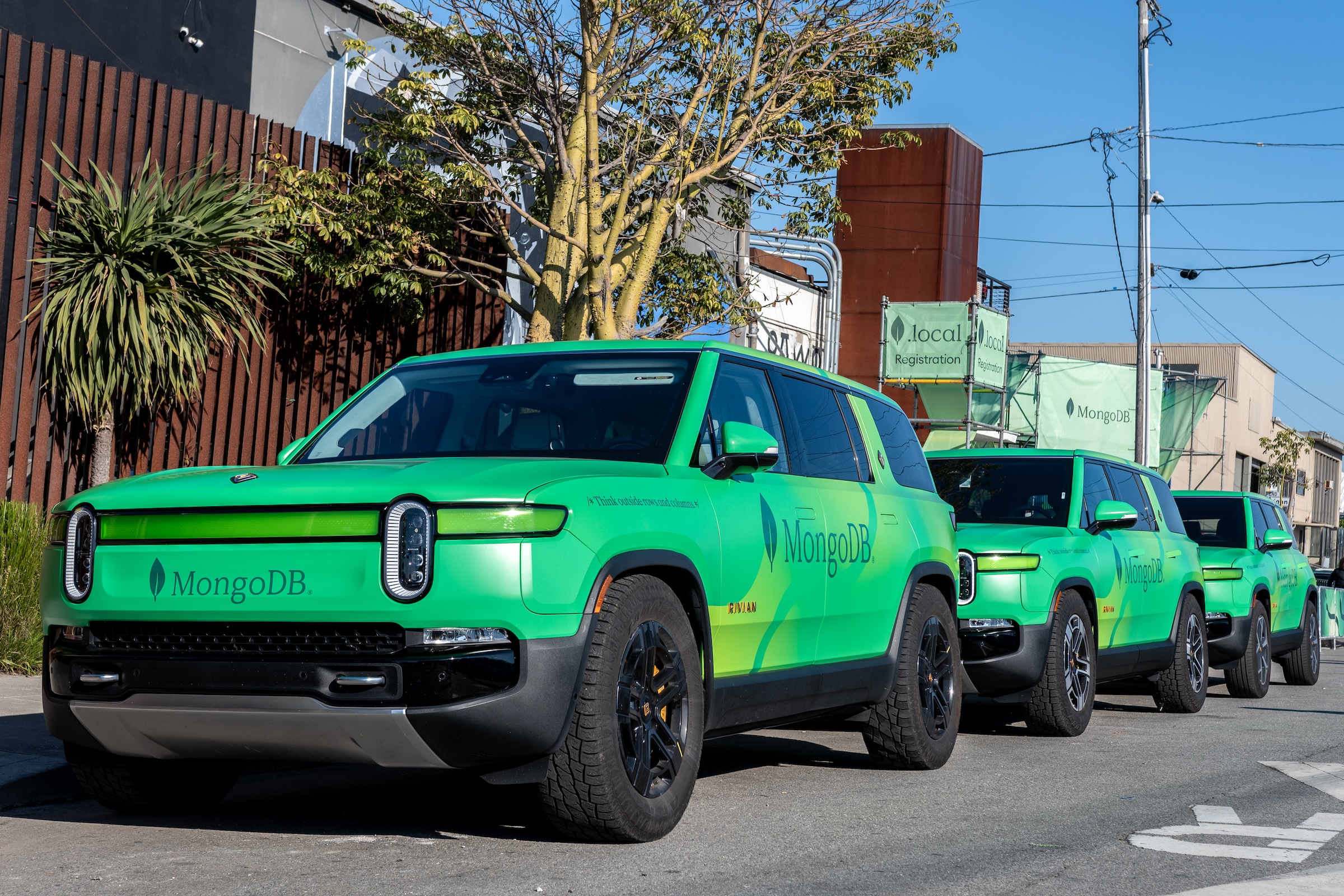 Rivian R1T R1S Custom wrapped R1S shuttles for MongoDB tech conference MongoDB_.local_01