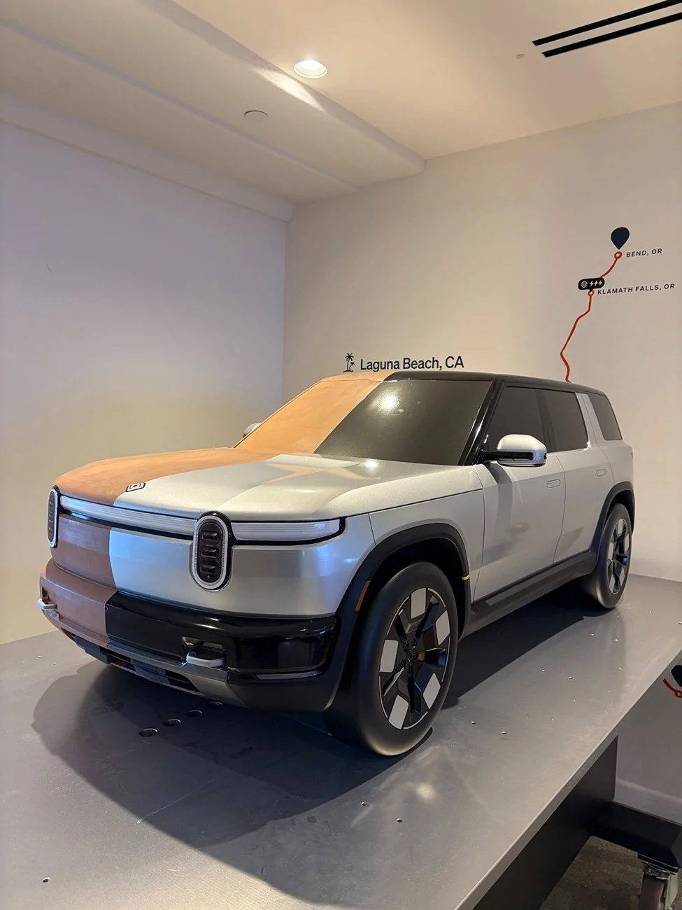 Rivian R1T R1S R2 clay design buck display at Rivian's Laguna South Coast Theater Space HBiwRxdbUAMVync