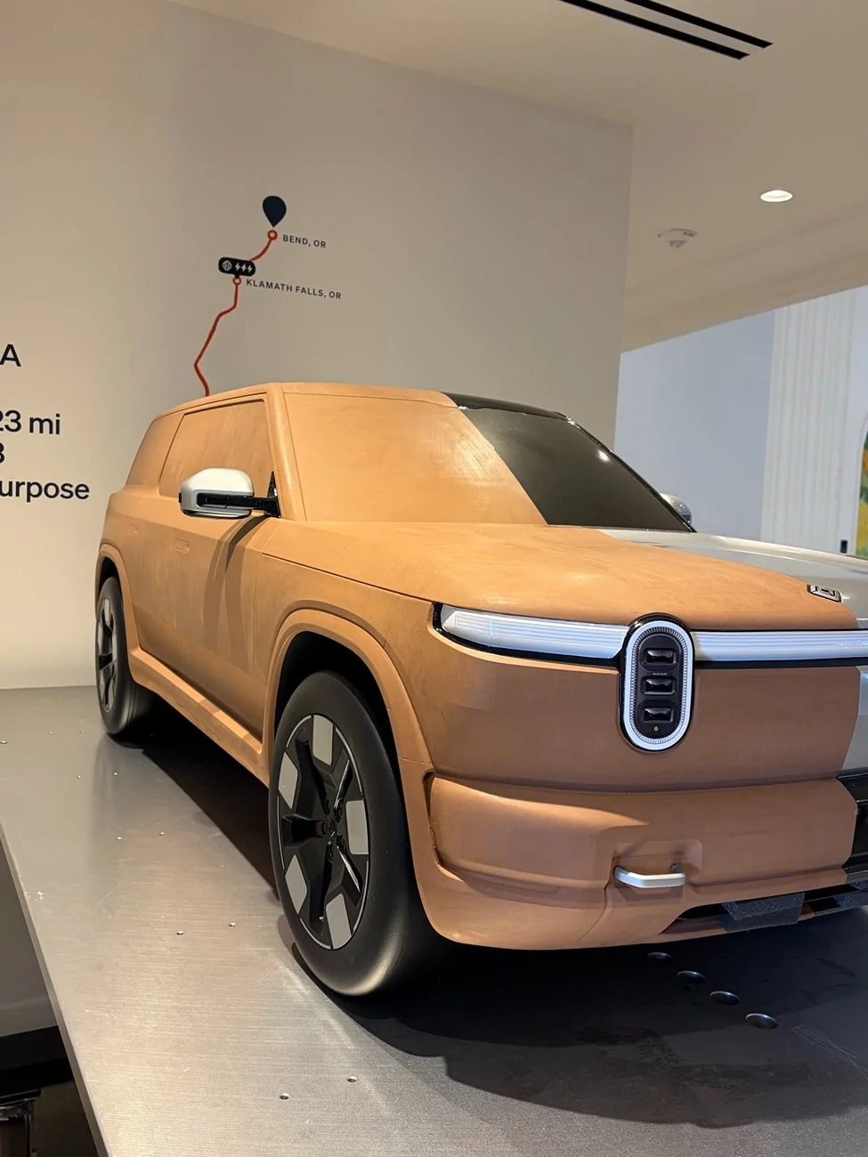 Rivian R1T R1S R2 clay design buck display at Rivian's Laguna South Coast Theater Space HBiwRxrboAAV2Ry