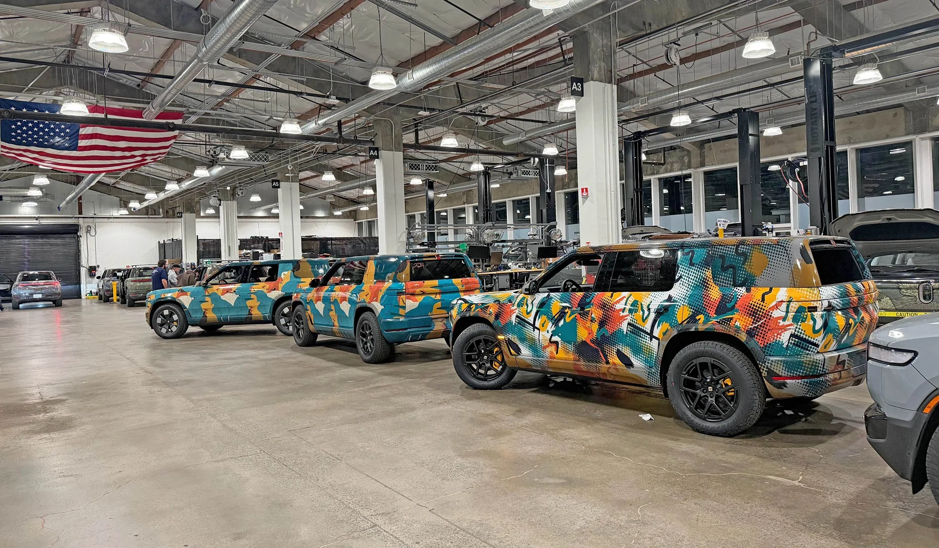 Rivian R1T R1S Wassym: My office view just got a lot more colorful (with R2 prototypes) HCBMf9waMAMjtnF