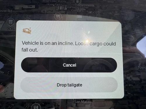 Rivian R1T R1S My turn! To close the garage door while opening the tailgate. IMG_2684