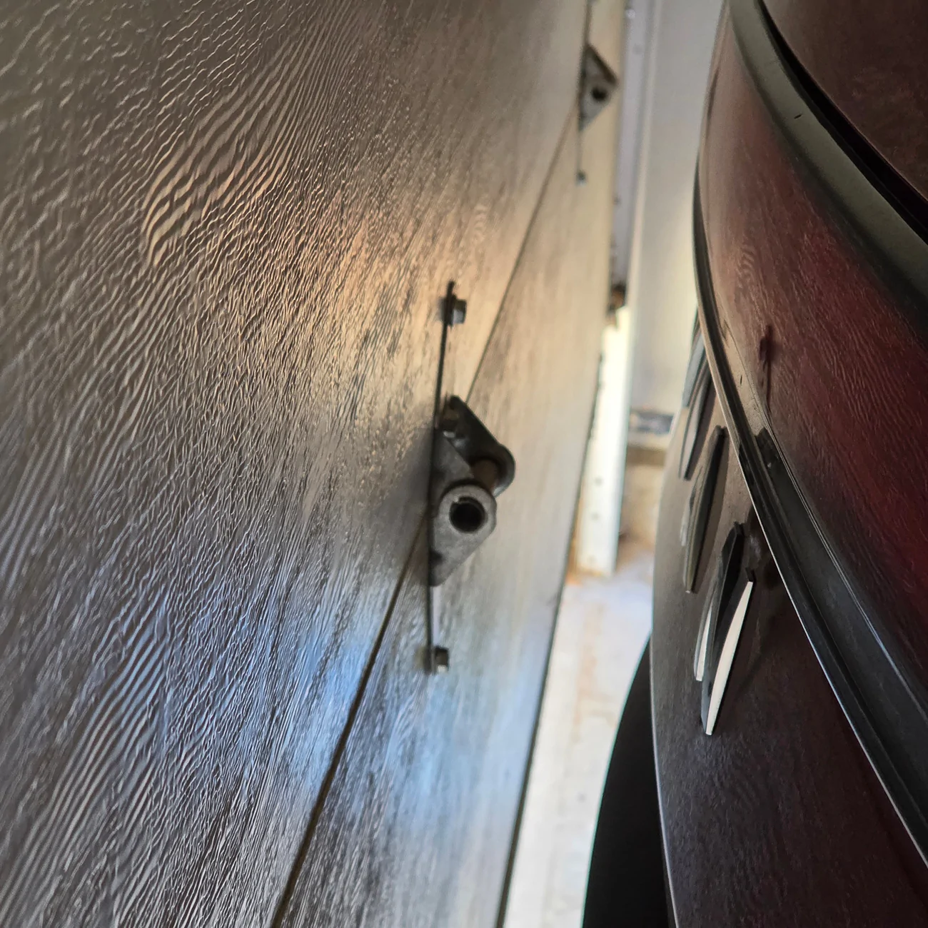 rivian tire stop garage hinge 2.webp
