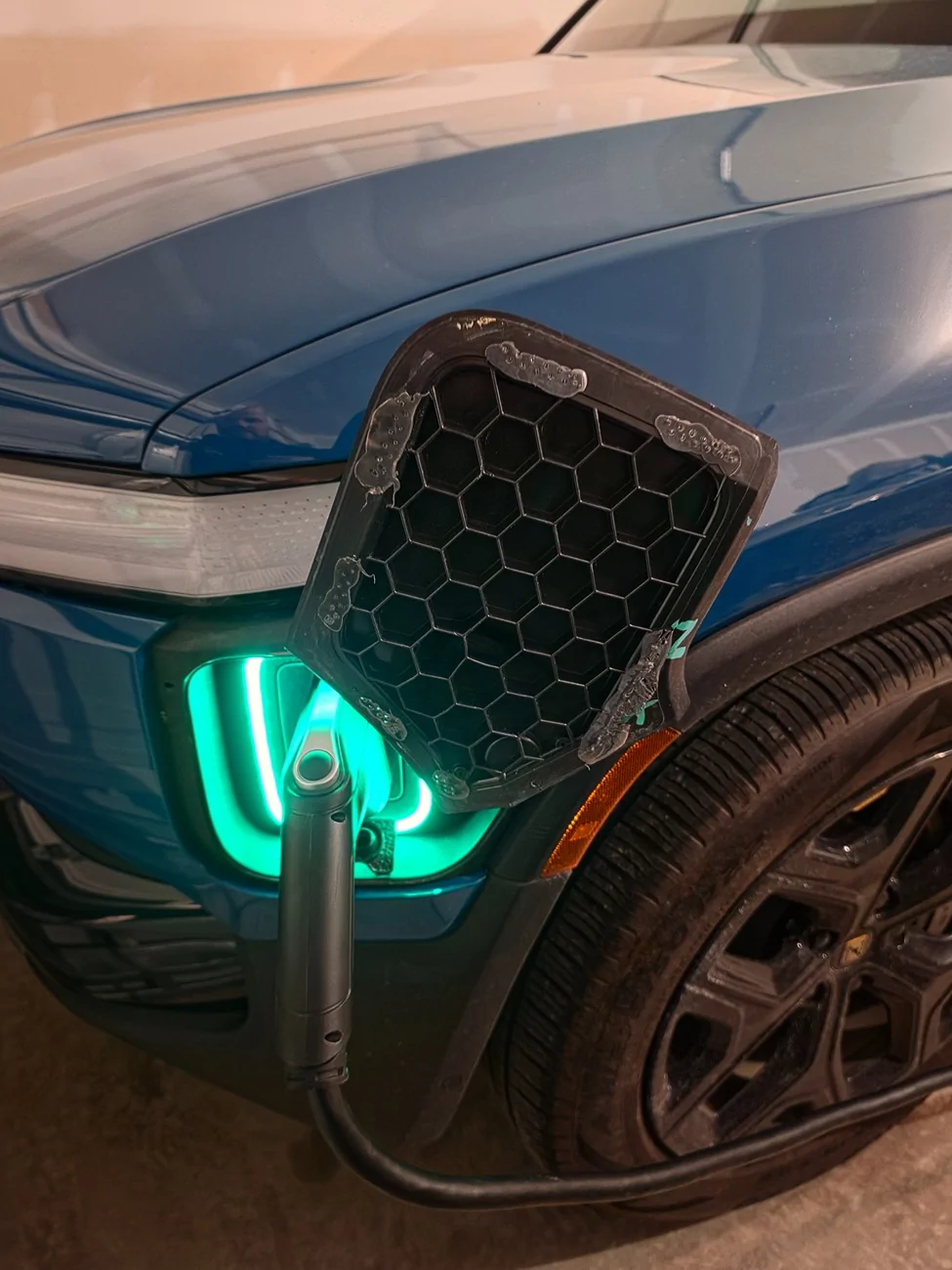 Rivian R1T R1S Charge port door cover fell off 20260316_223210