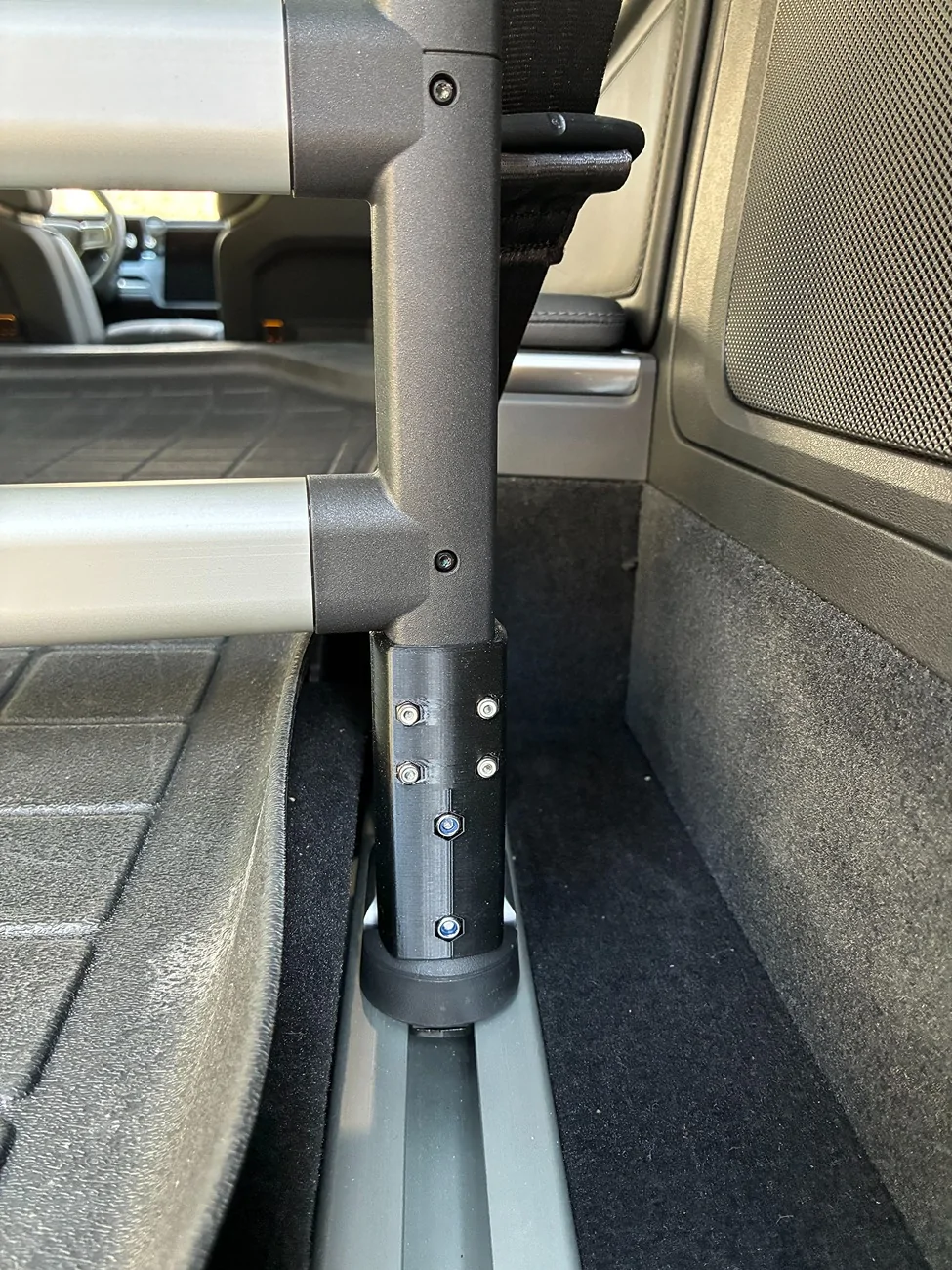 Rivian R1T R1S Suggestions for quality cargo net for R1S Leg in Hold Down