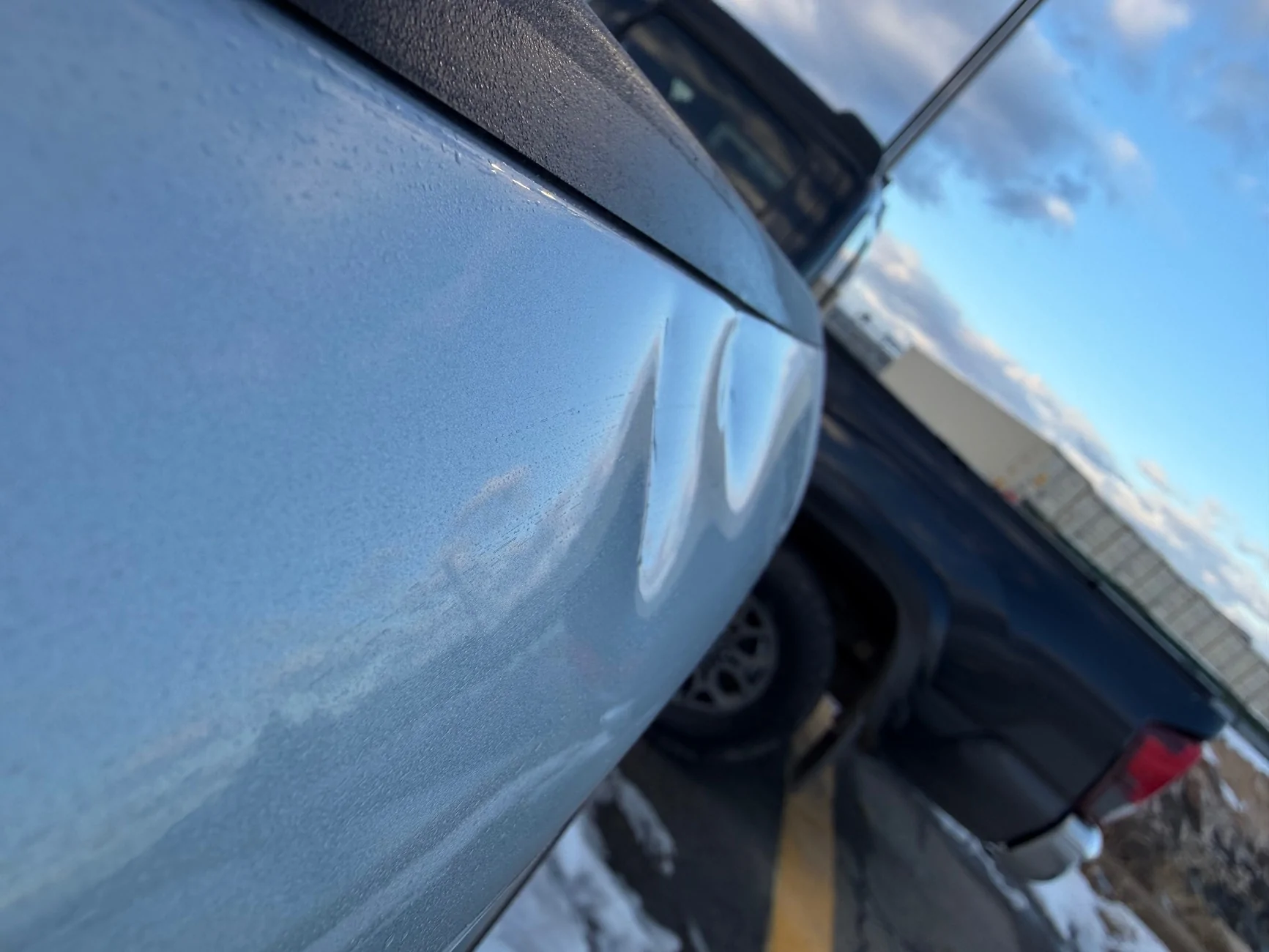 Rivian R1T R1S Dent and scratches in tailgate IMG_0317