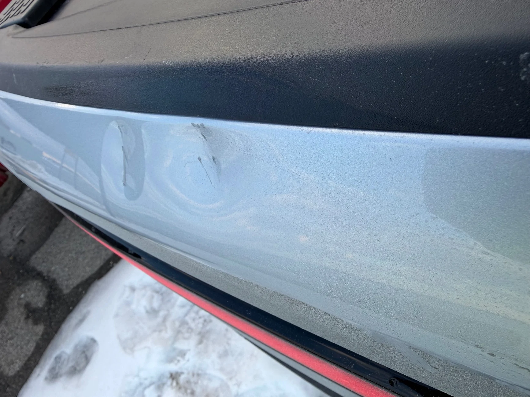 Rivian R1T R1S Dent and scratches in tailgate IMG_0314
