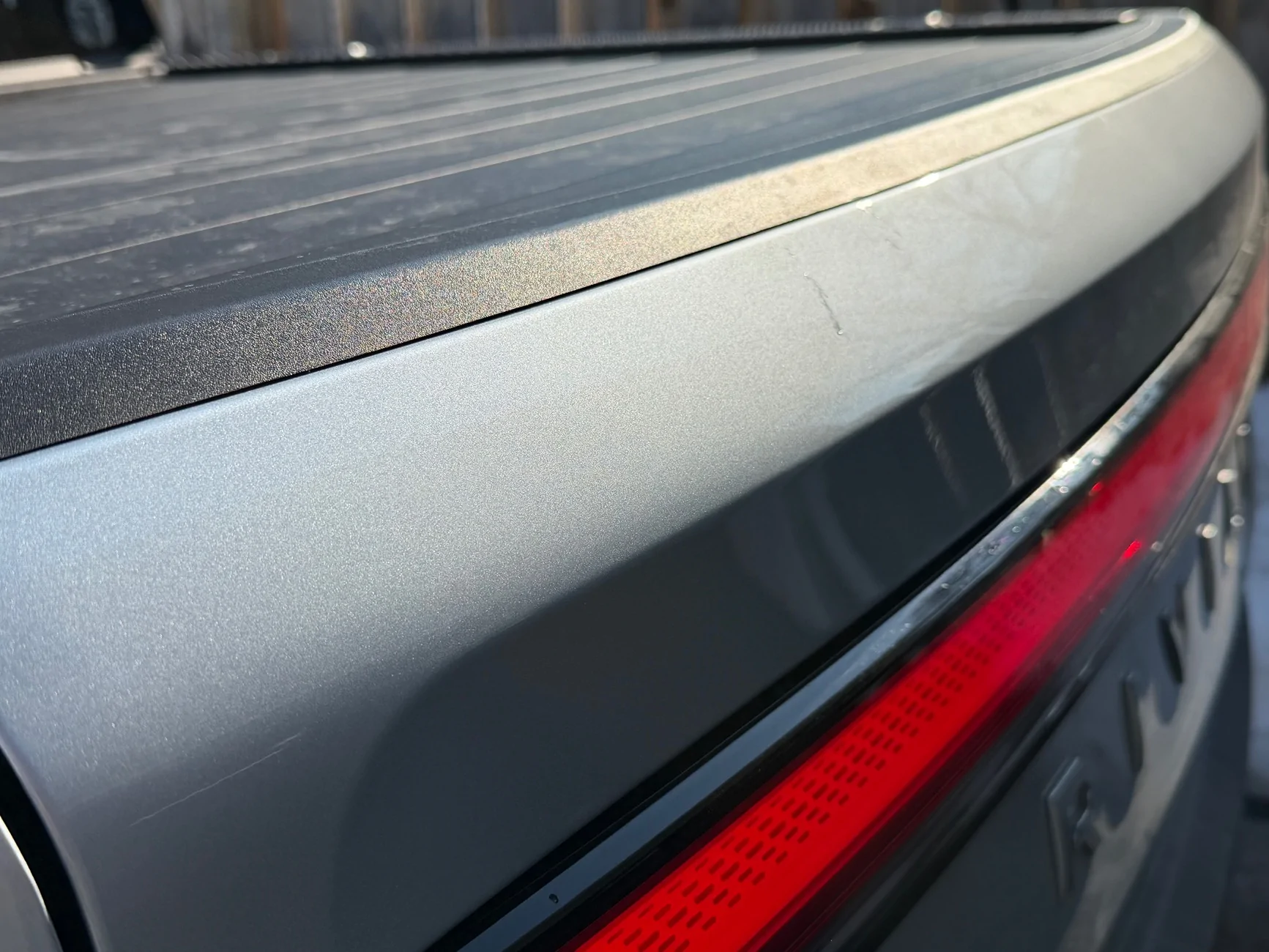 Rivian R1T R1S Dent and scratches in tailgate IMG_0335