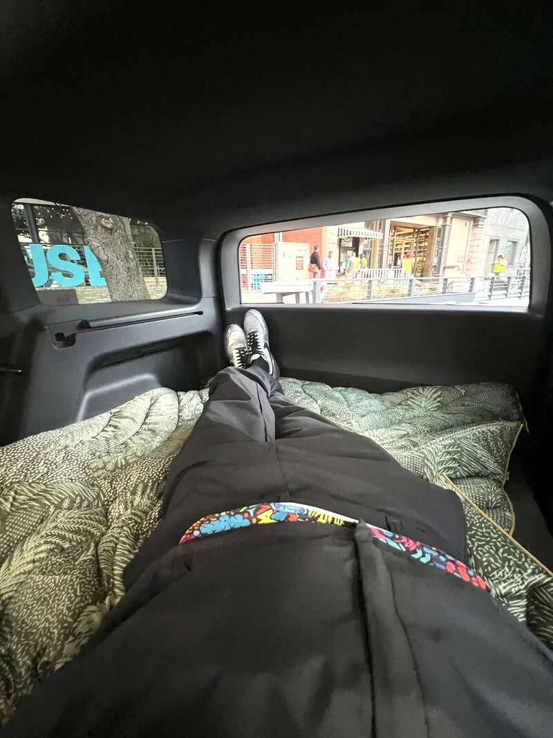 Rivian R1T R1S Sleeping / camping in back of R2 cargo area - 6'4" tall person fits (diagonally) sleeping  mattress rivian r2 cargo area