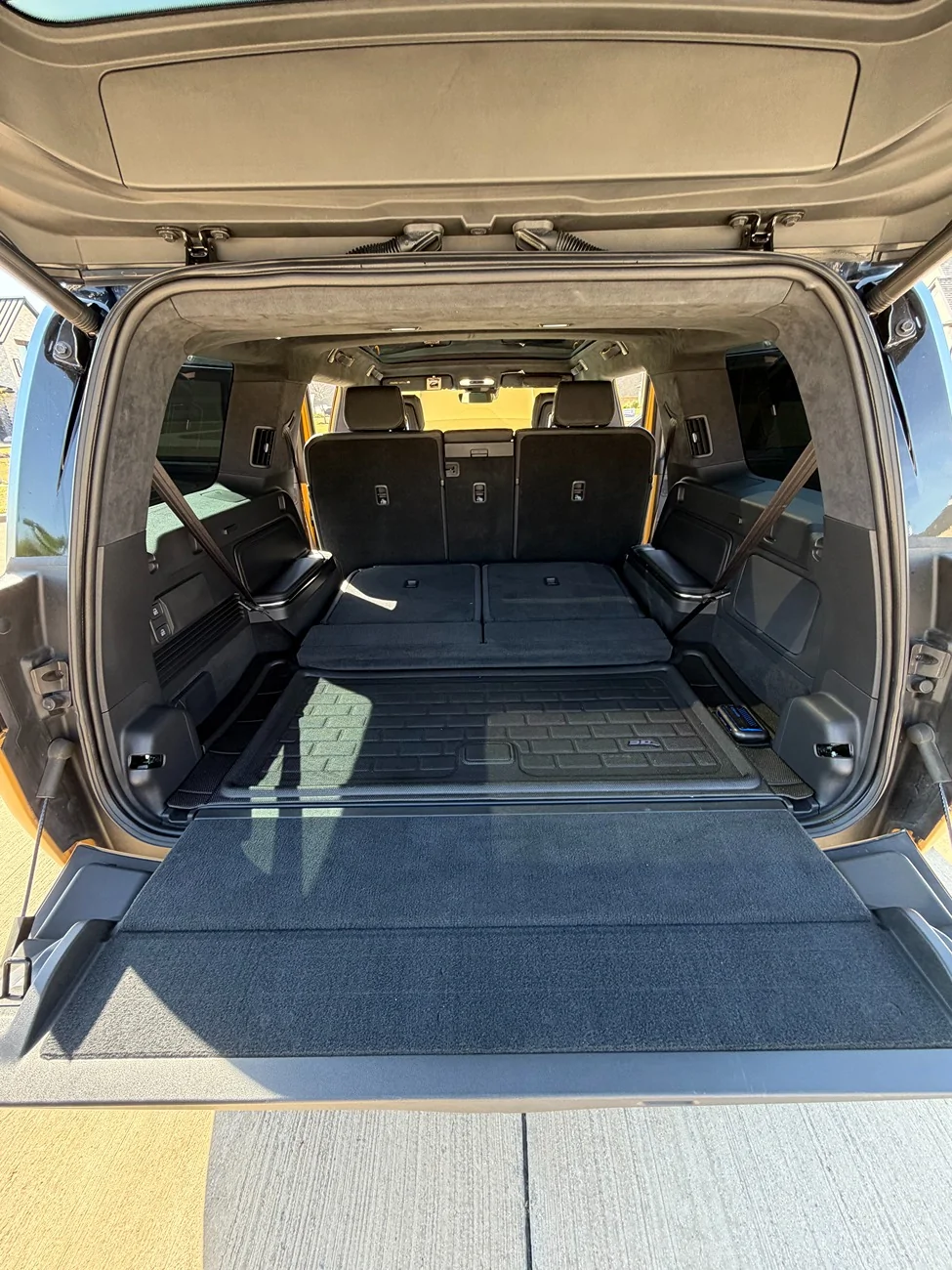 Rivian R1T R1S 2023 R1S Quad Motor Adventure AWD | Large Pack | Compass Yellow | Full PPF | ~25,150 Mi | $65,500 Rivian_R1S_Cargo_Liftgate_Open_Seats_Folded_03
