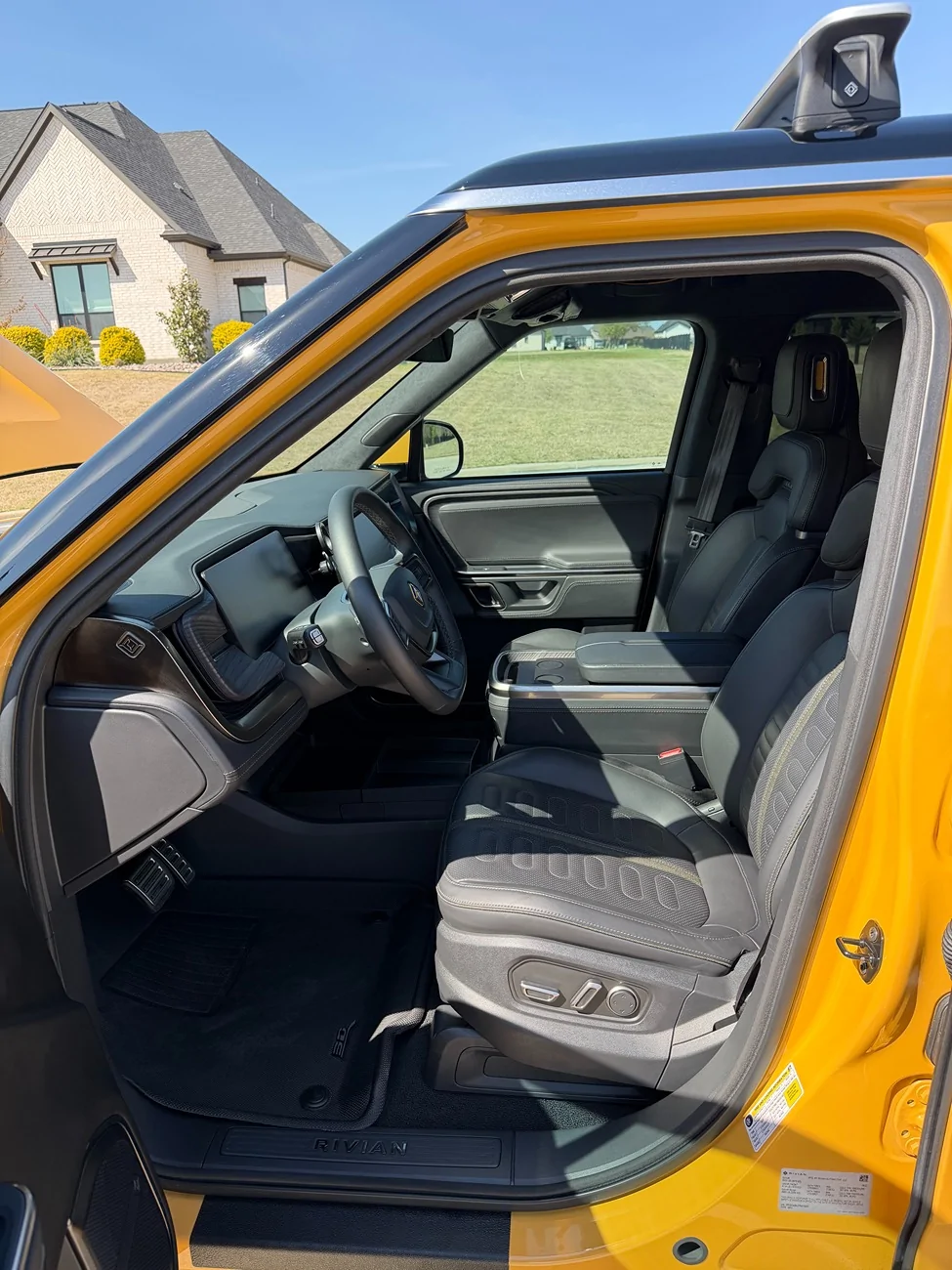 Rivian R1T R1S 2023 R1S Quad Motor Adventure AWD | Large Pack | Compass Yellow | Full PPF | ~25,150 Mi | $65,500 Rivian_R1S_Interior_Front_Seats_Door_Open