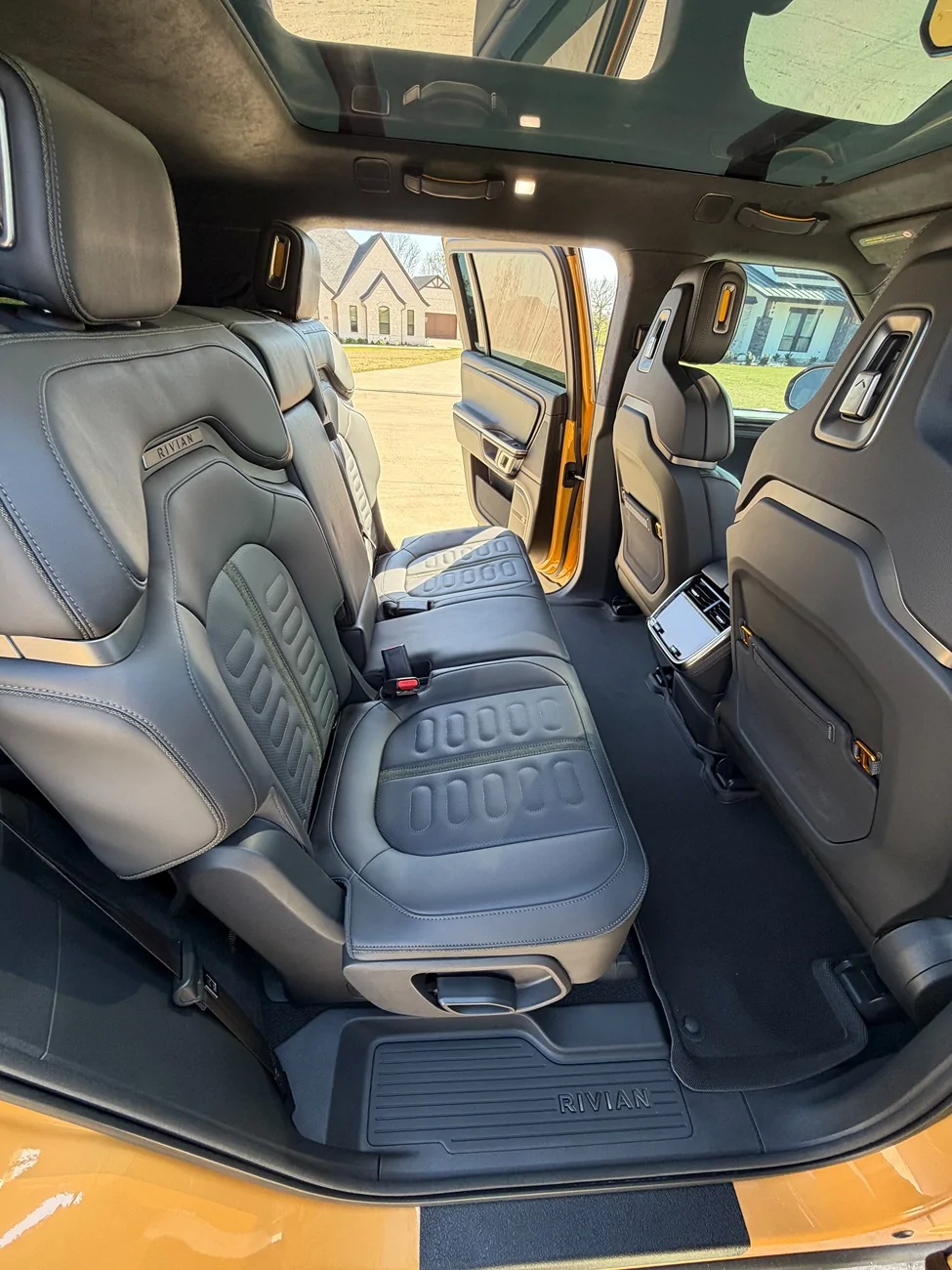 Rivian R1T R1S 2023 R1S Quad Motor Adventure AWD | Large Pack | Compass Yellow | Full PPF | ~25,150 Mi | $65,500 009 - Rivian_R1S_Interior_Second_Row_Rear_Doors_Open