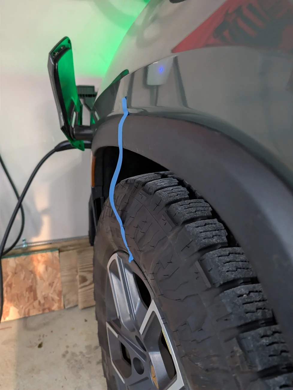 Rivian R1T R1S Front suspension dropping slowly while parked, normal? PXL_20260404_122818314