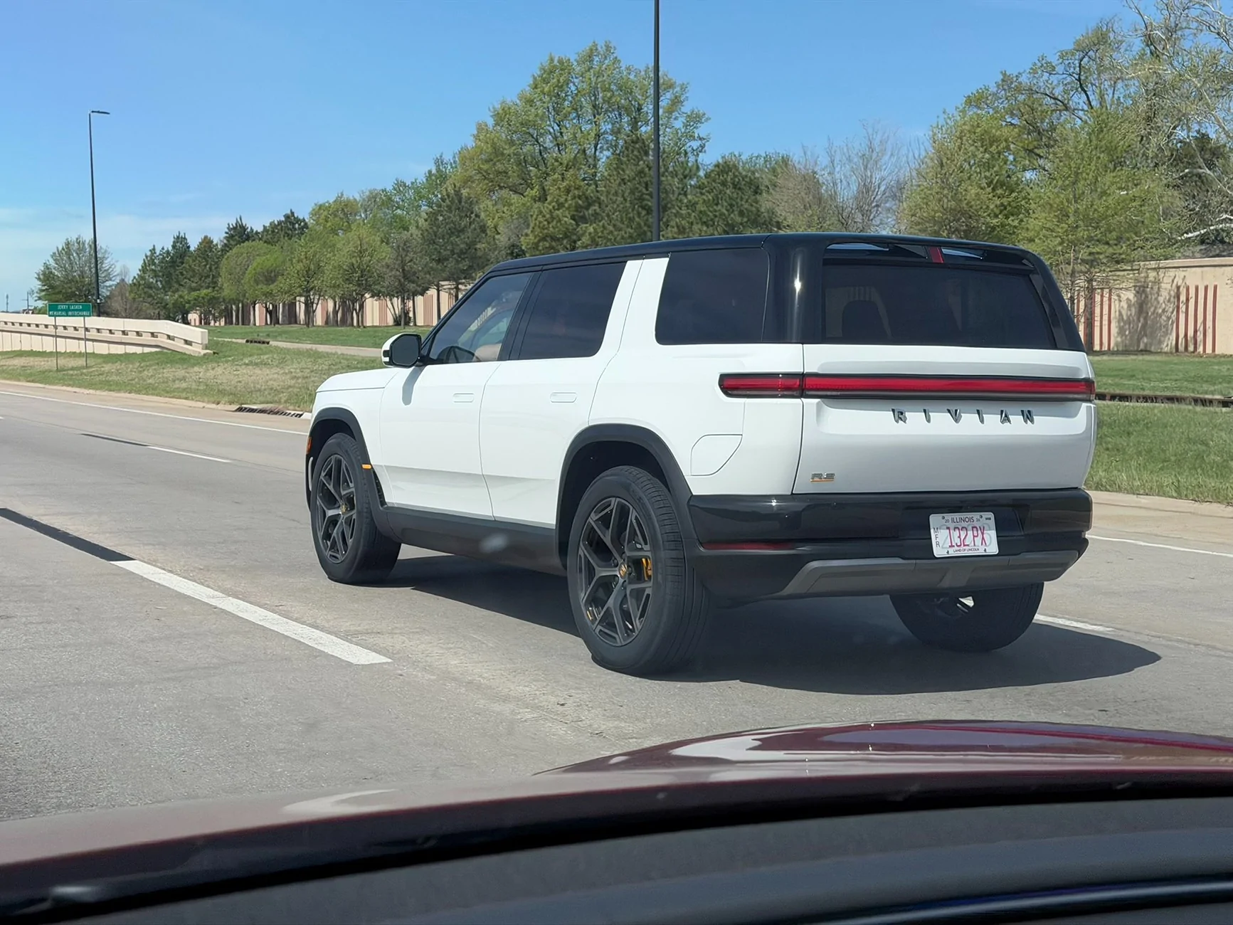 Rivian R1T R1S Glacier White R2 on 21" wheels spotted driving - pics & video Glacier White Rivian R2 2