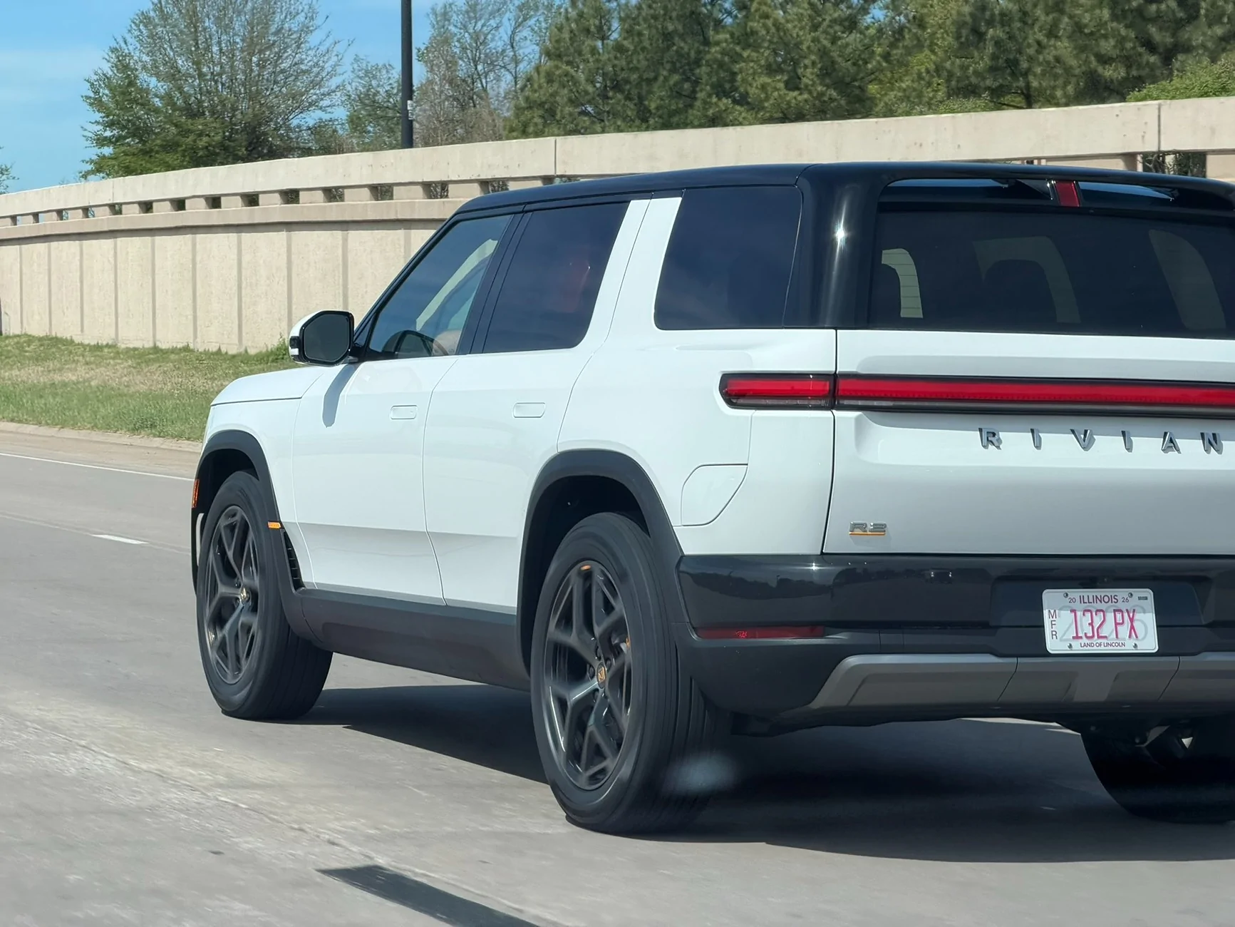 Rivian R1T R1S Glacier White R2 on 21" wheels spotted driving - pics & video Glacier White Rivian R2 1