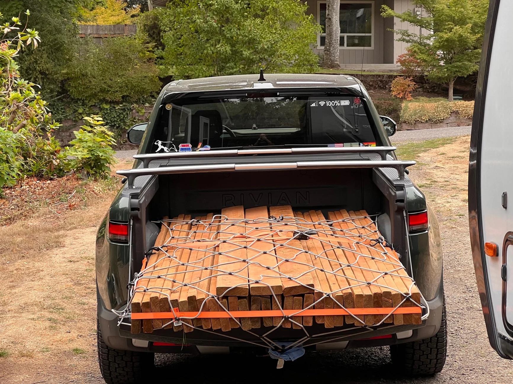 Rivian R1T R1S Securing plywood in R1T bed IMG_4949