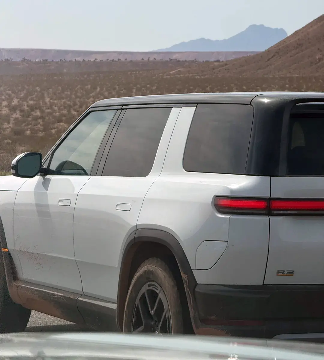 Rivian R1T R1S Glacier White R2 Rivians spotted in Irvine & LAX r2-on-i-15-s-between-st-george-and-vegas-v0-qzmpoddqgnvg1