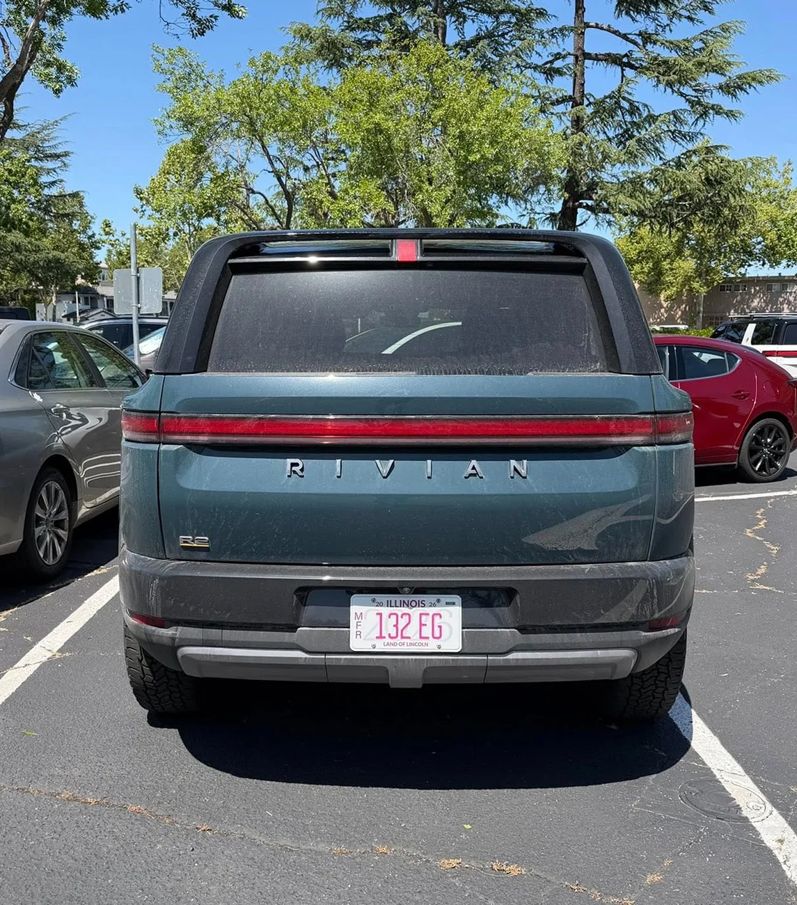Rivian R1T R1S Catalina Cove R2 Launch Edition on road (video) and non-Launch Edition in Rivian parking lot (pics) Rivian R2 Catalina Cove blue green color 1