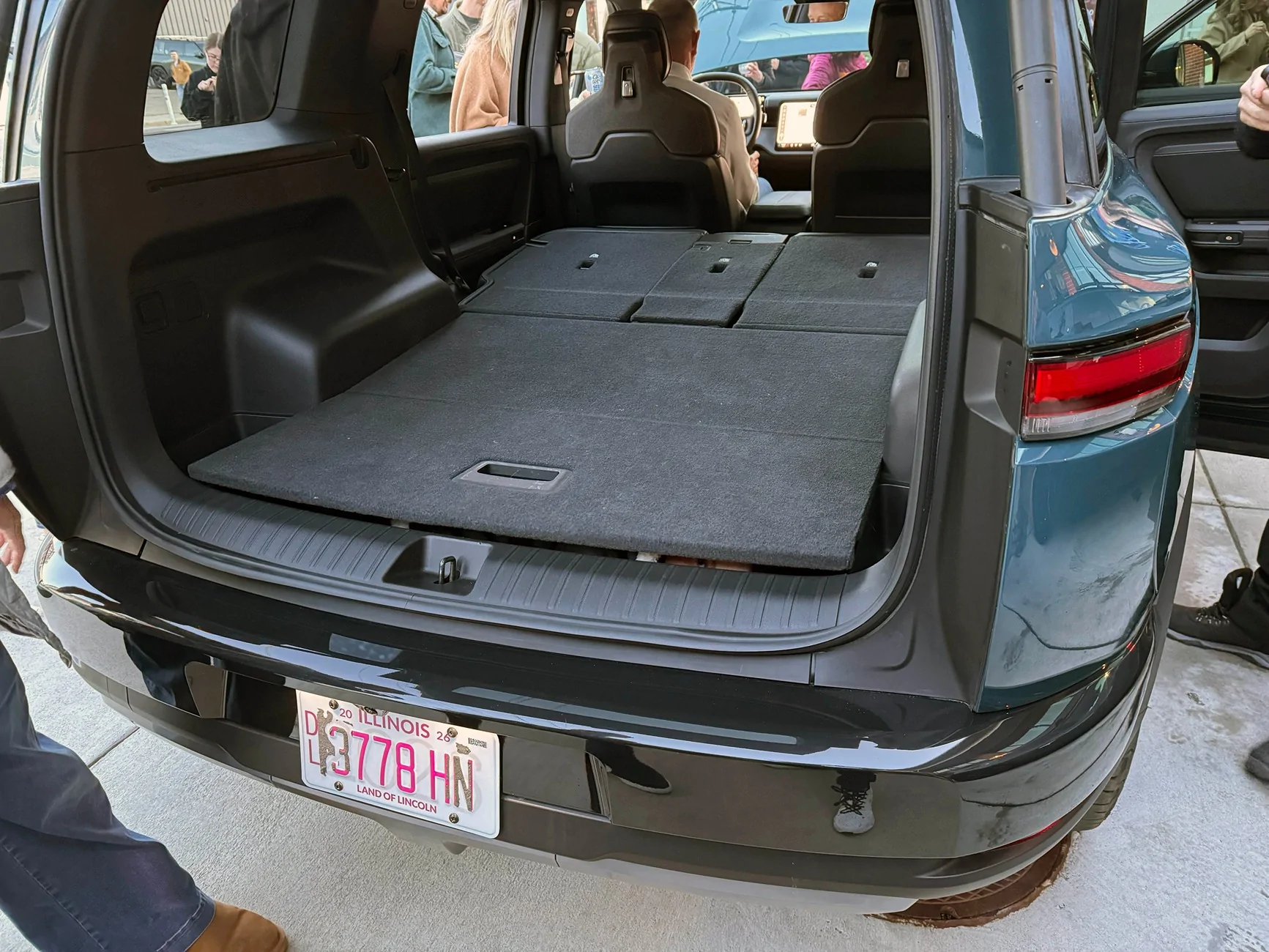 Rivian R1T R1S R2 cargo area underfloor storage compartment size = large enough to fit small body rivian r2 cargo area underfloor storage compartment 1