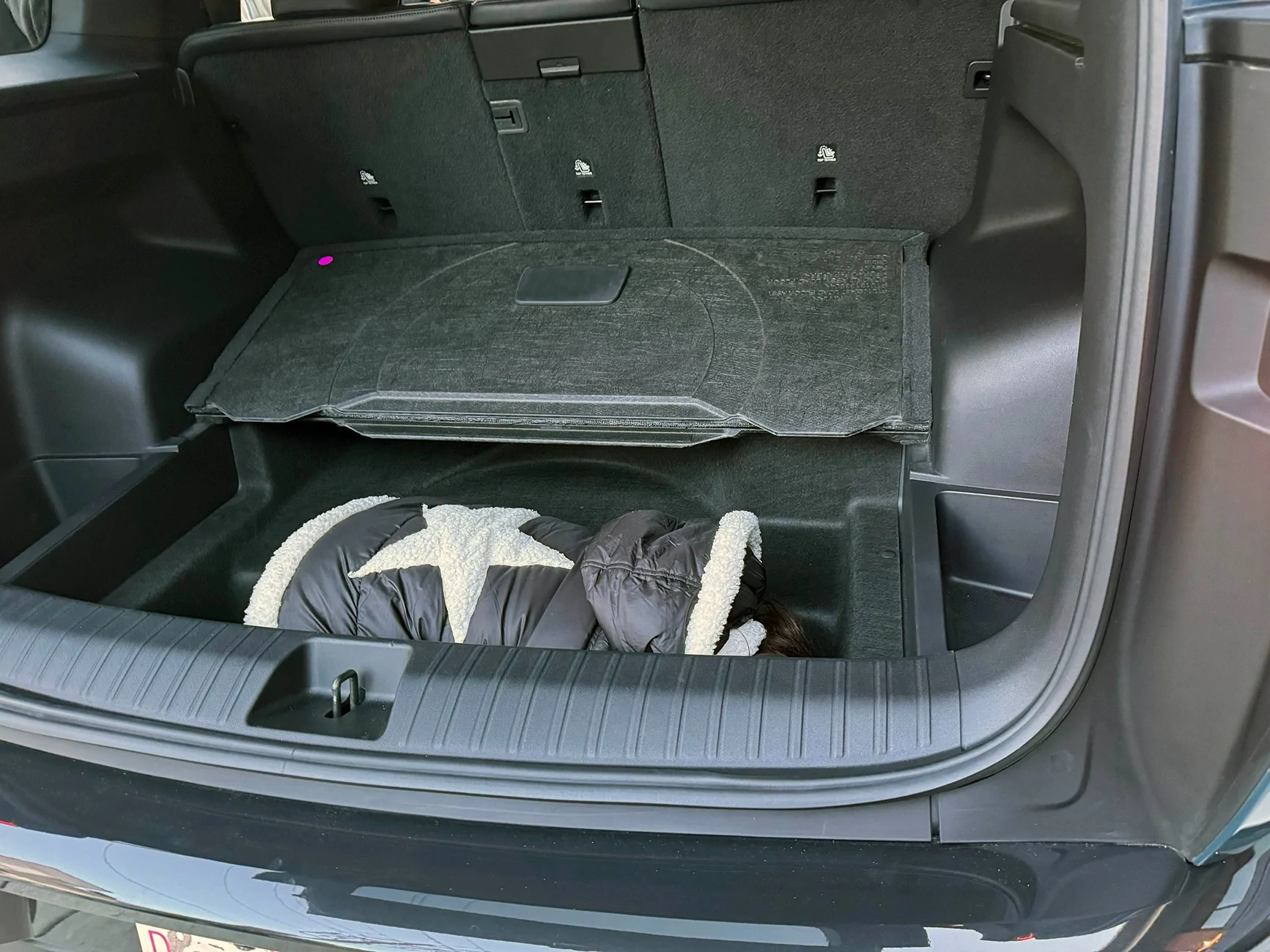 Rivian R1T R1S R2 cargo area underfloor storage compartment size = large enough to fit small body rivian r2 cargo area underfloor storage compartment 2