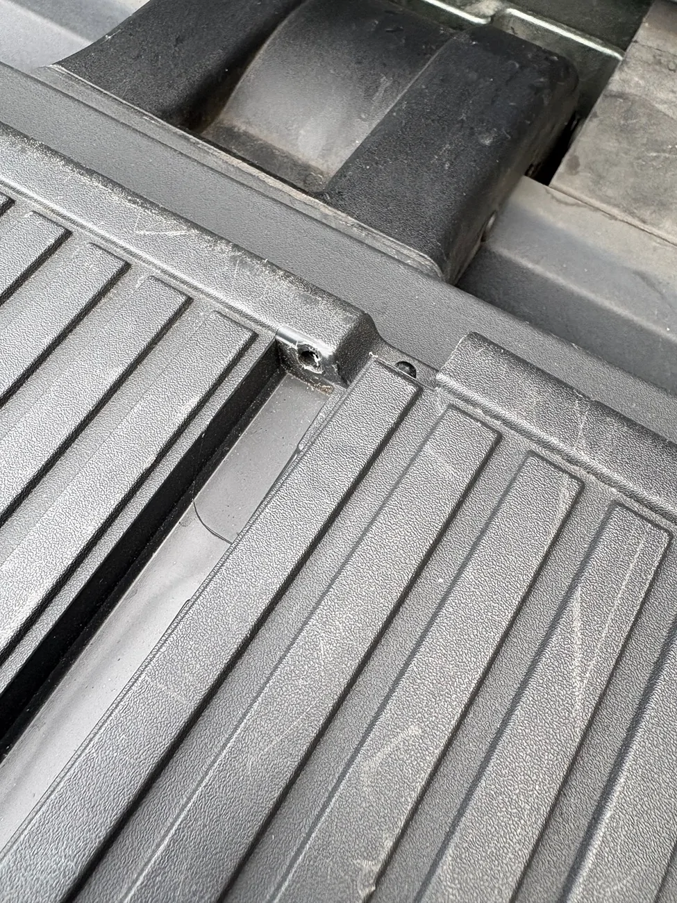 Rivian R1T R1S Gear tunnel door storage fail (door w/ compressor hose hinges failed) IMG_2543