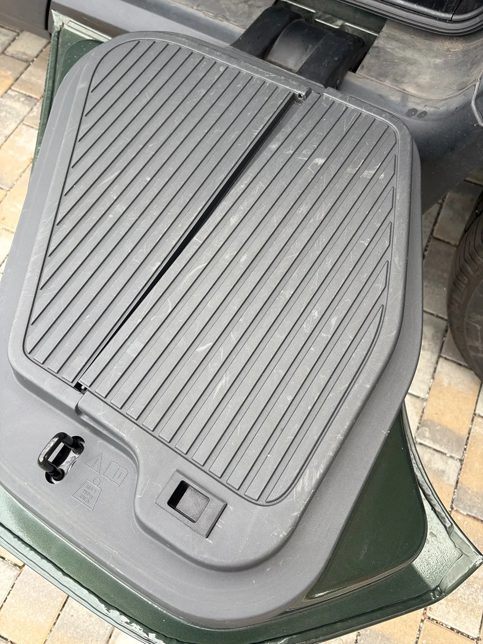 Rivian R1T R1S Gear tunnel door storage fail (door w/ compressor hose hinges failed) IMG_2542