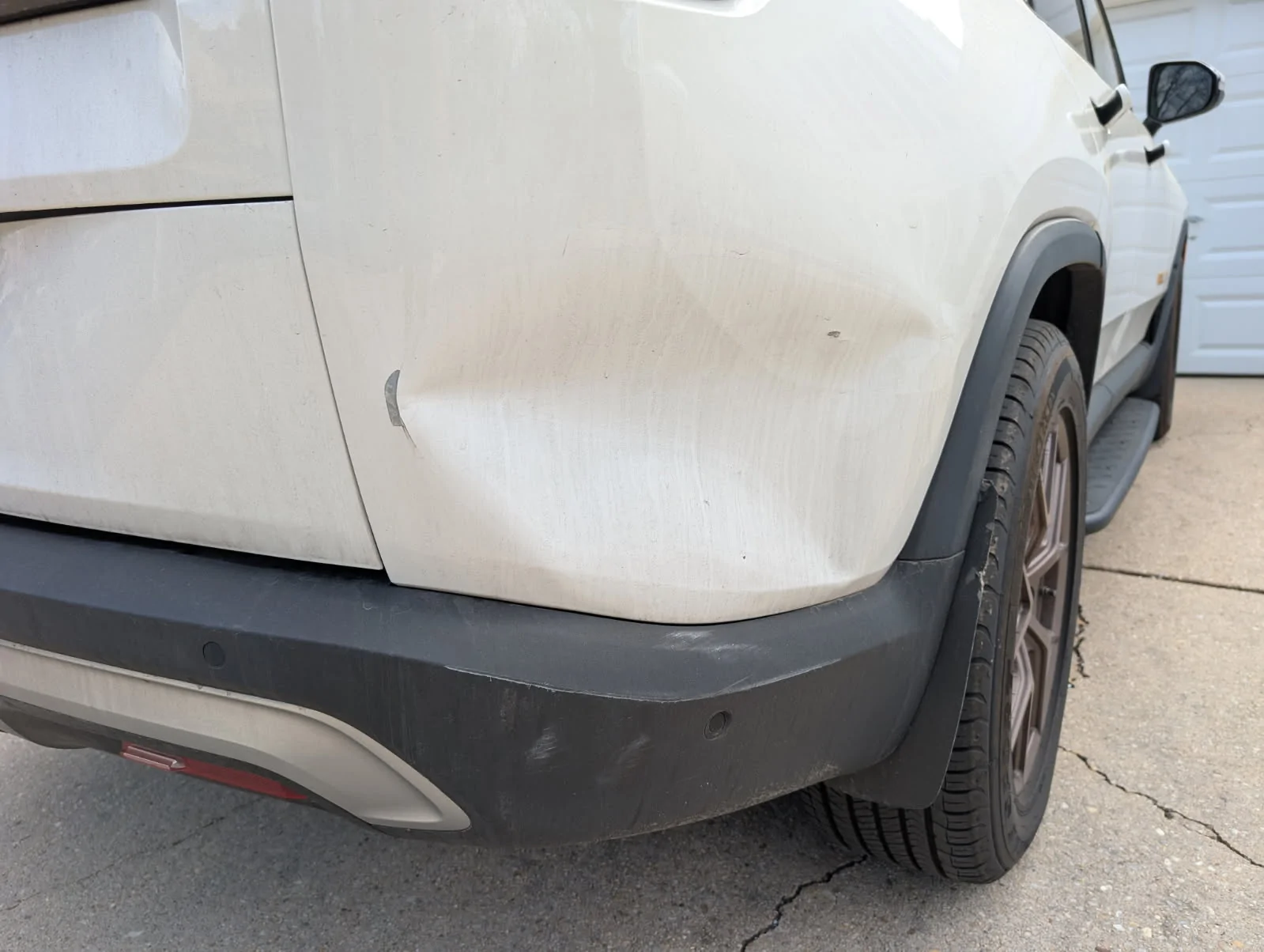 Rivian R1T R1S Looking for feedb dent repair, IMG_20260428_204441