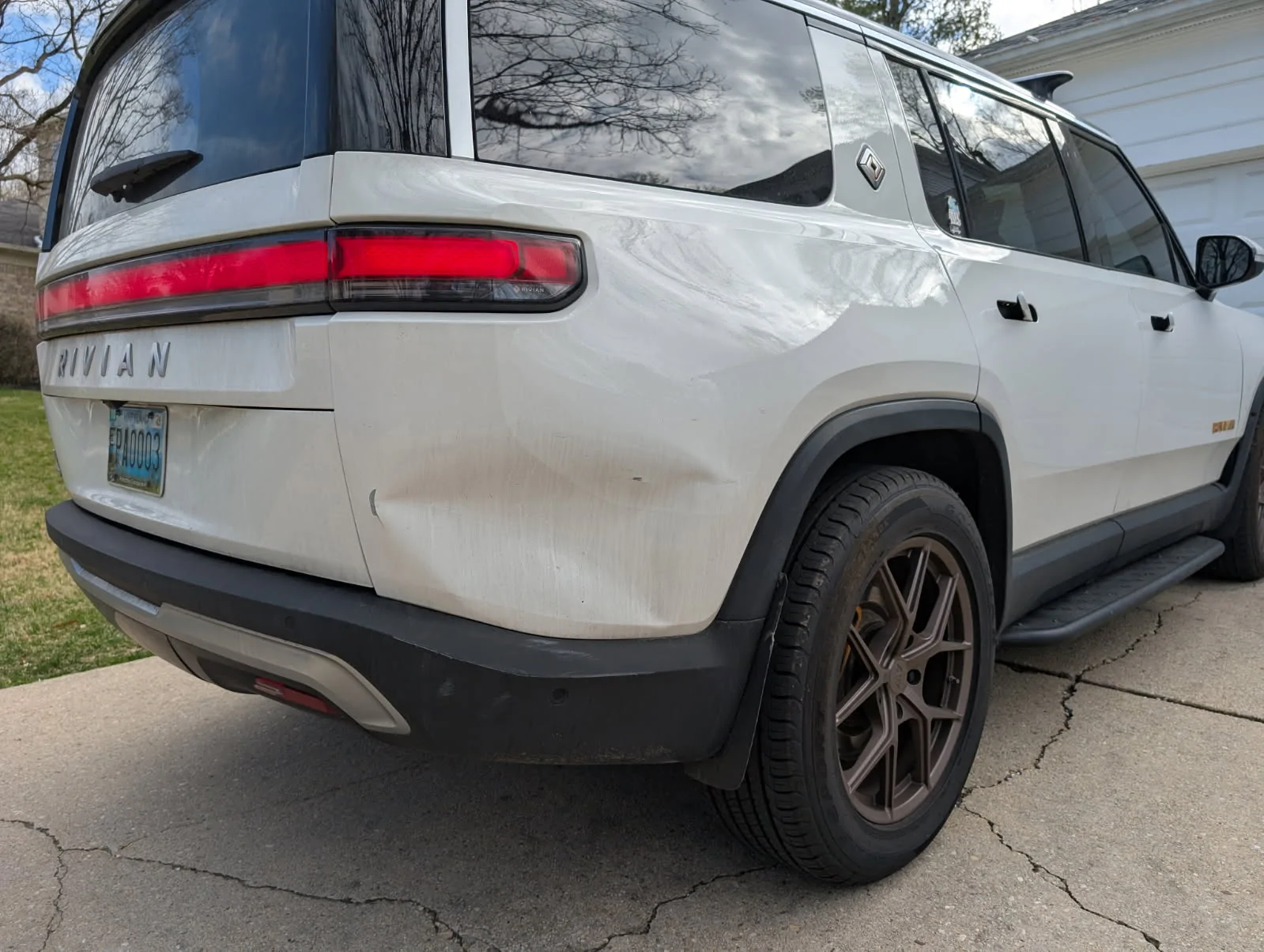Rivian R1T R1S Looking for feedb dent repair, IMG_20260428_204444