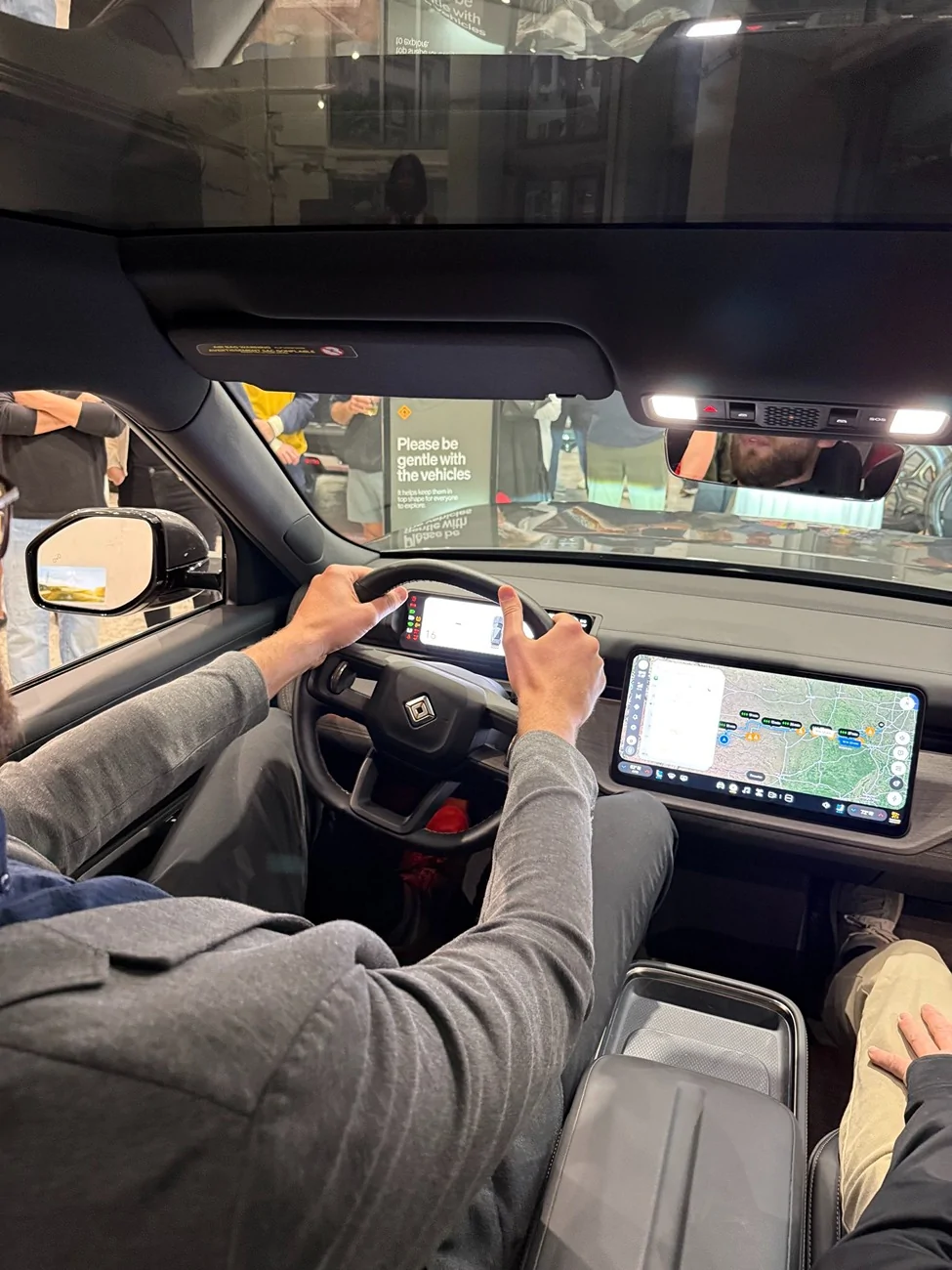 Rivian R1T R1S Tall & big people fit in R2 with impressive legroom & headroom (even 7 foot driver / passenger!) tall driver leg room rivian r2 interior 3