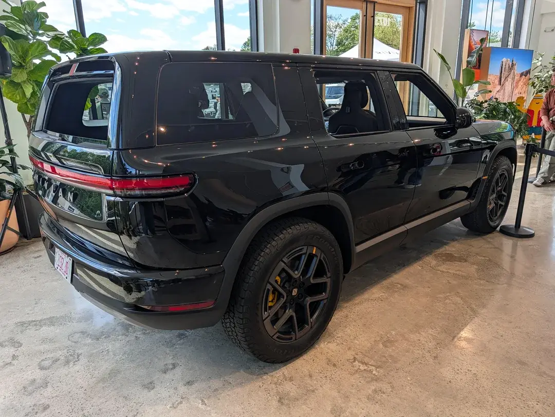 Rivian R1T R1S R2 Block Party @ Roslyn NY - Half Moon Grey, Catalina Cove, Midnight Black R2 photos & video Midnight Black R2 rear quarter vi