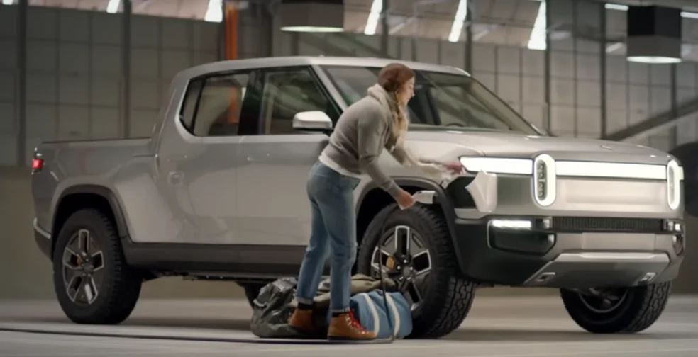 Rivian R1T R1S Story: Rivian Adventure Network (RAN) Scaling for R2 and Beyond 1778019615588-sy