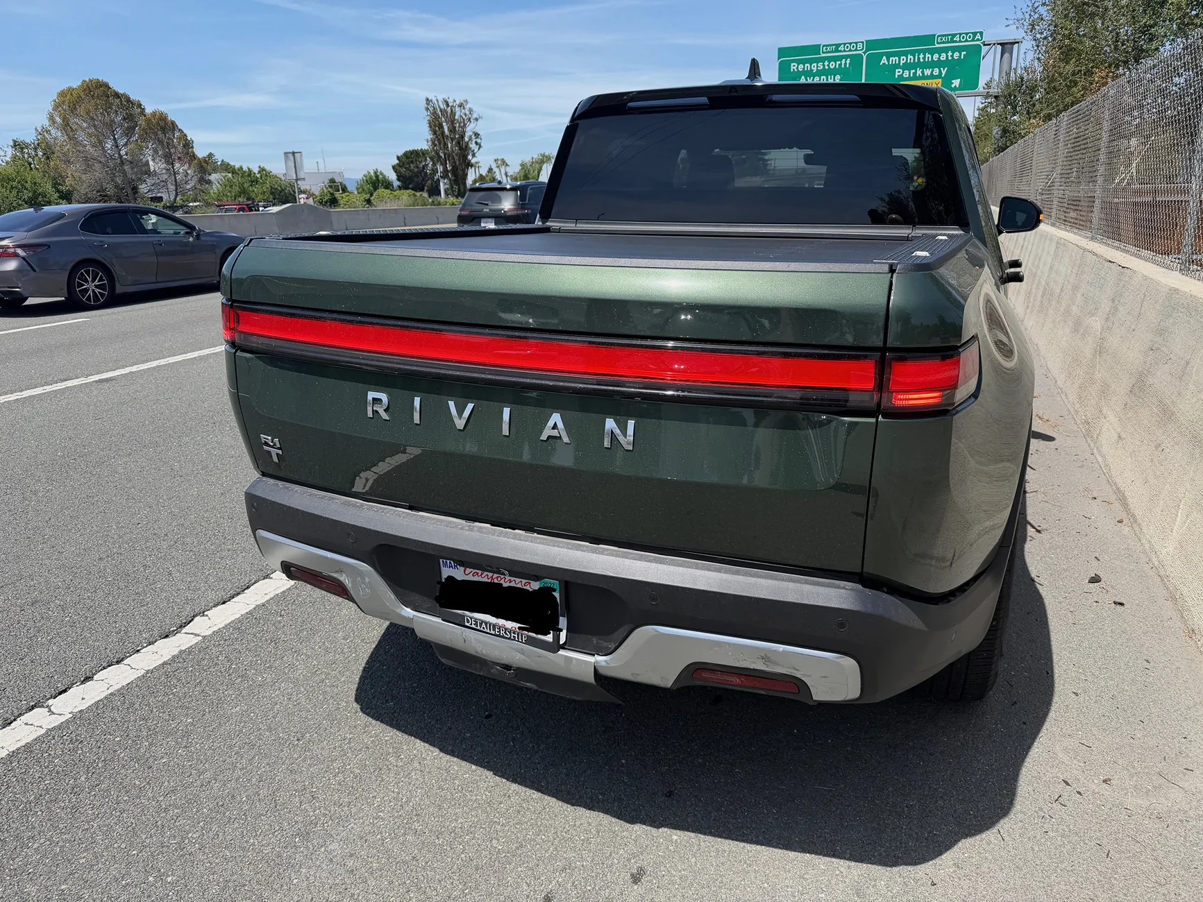 Rivian R1T R1S I pity the textin-foo in the Tesla who barrels into a R1T... IMG_1200