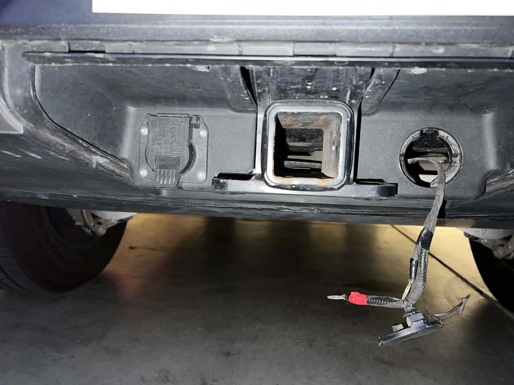 Rivian R1T R1S Wire Harness found behind hitch cap IMG_8016