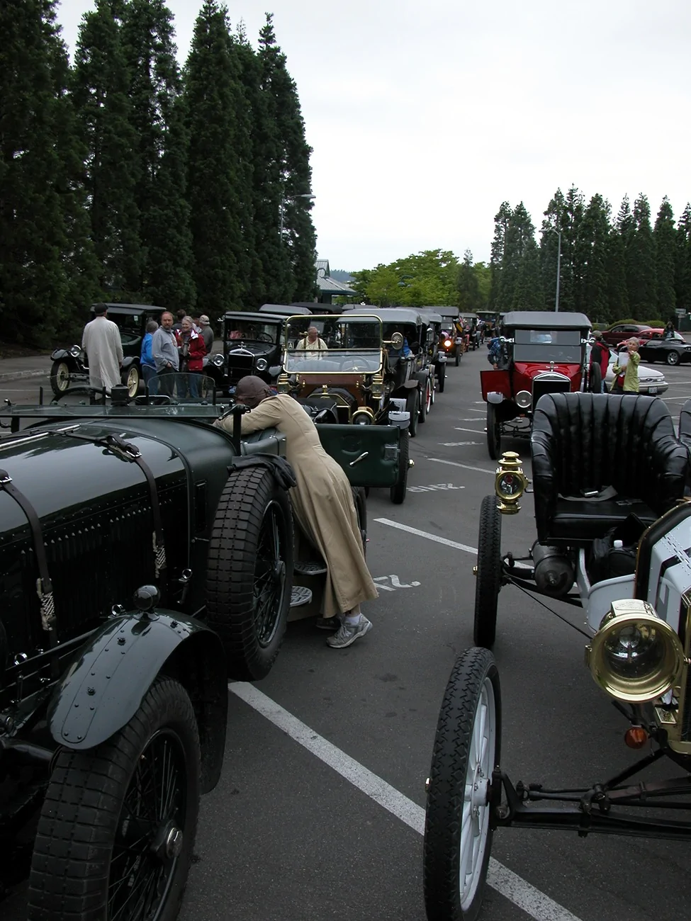Rivian R1T R1S 100 years later- look closely-not AI ModelTs