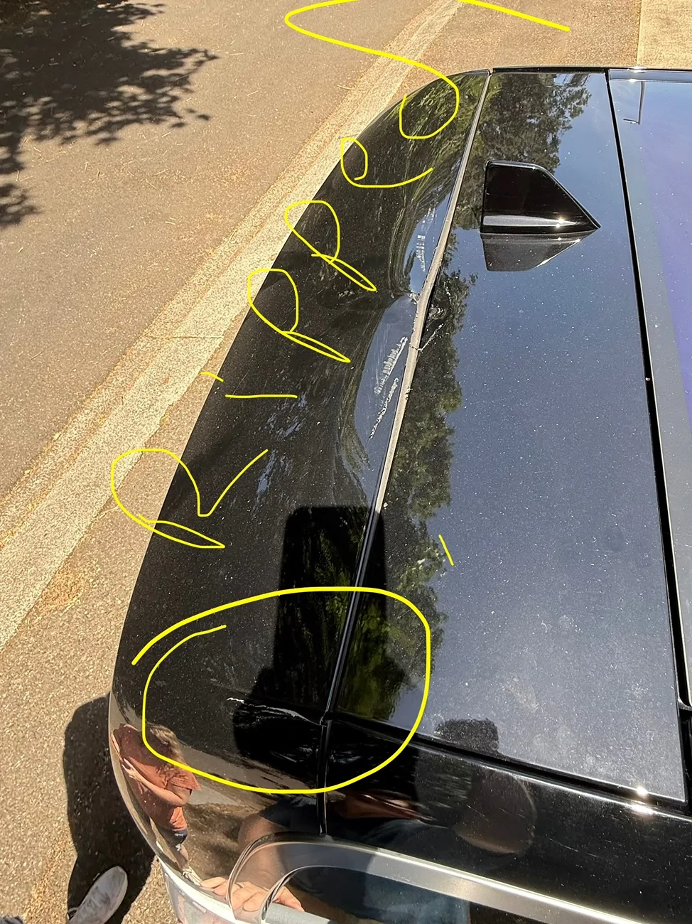 Rivian R1T R1S R1S lift gate hit the roof damaging the lift gate and the roof IMG_1970