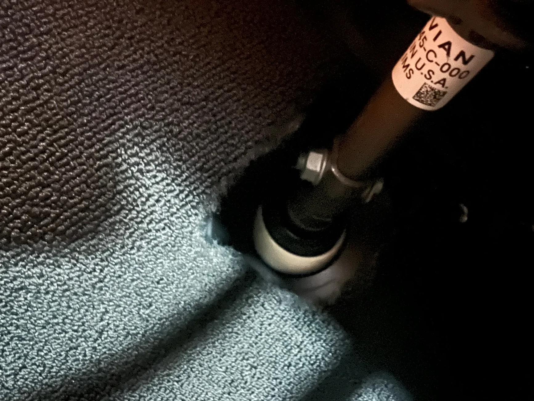 Rivian R1T R1S Wet spot under driver mat IMG_4527