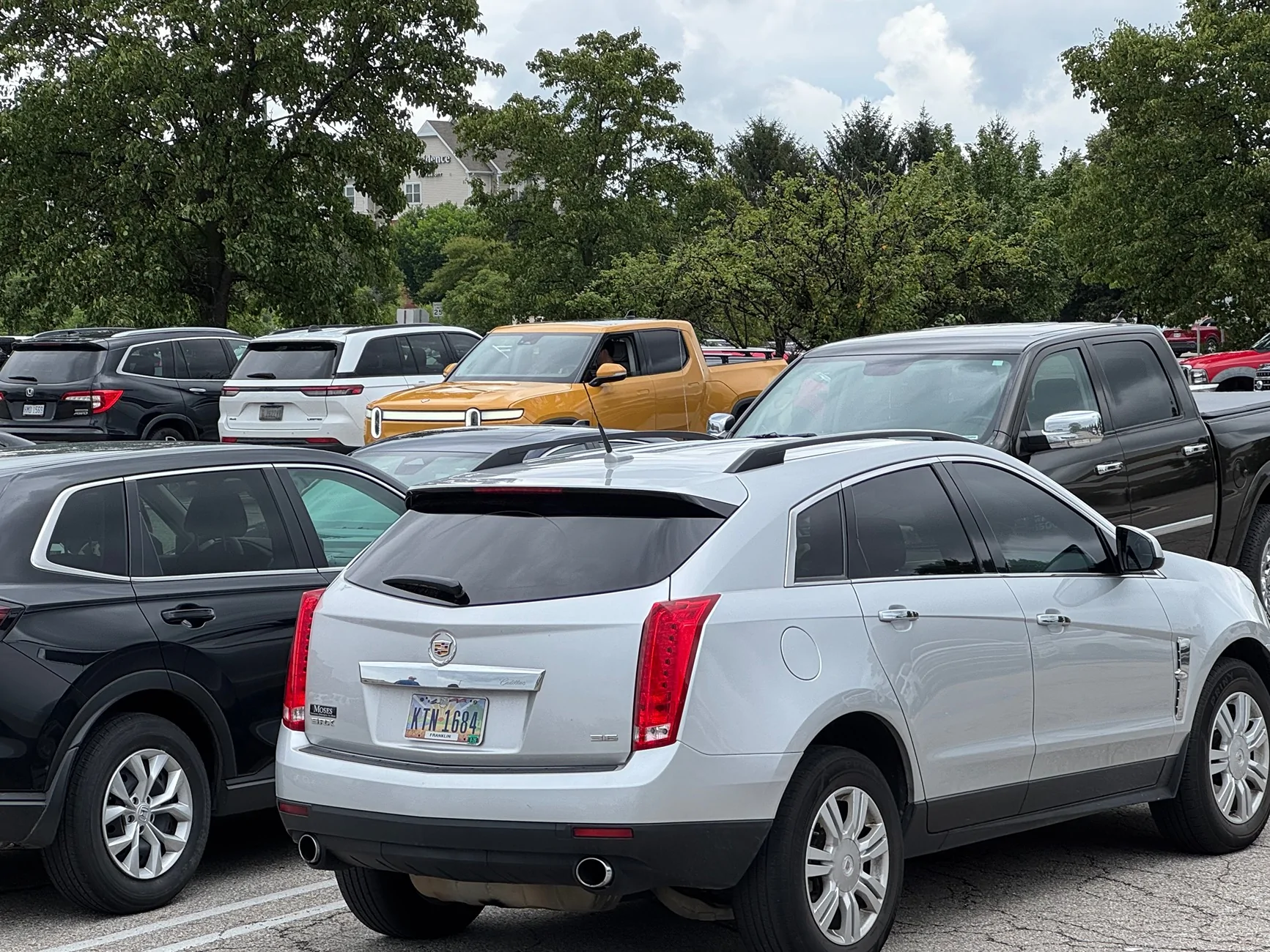 Rivian R1T R1S A Rare & Elusive Creature, I Mean Vehicle, Spotted in the Wild! 🧭💛 IMG_4396