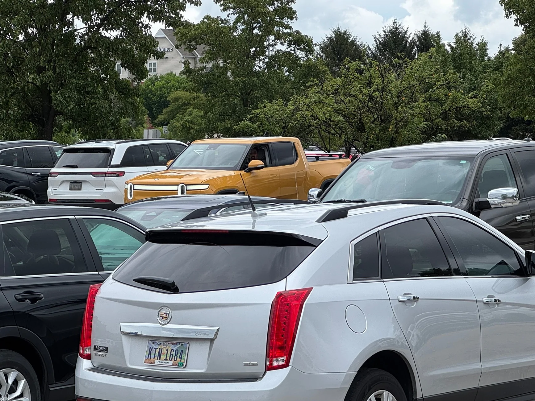 Rivian R1T R1S A Rare & Elusive Creature, I Mean Vehicle, Spotted in the Wild! 🧭💛 IMG_4397