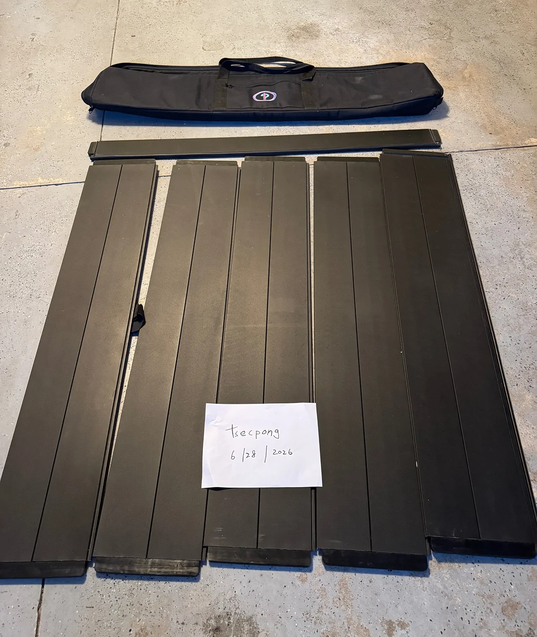 Rivian R1T R1S Interrobang tonneau cover with original storage bag IMG_9341