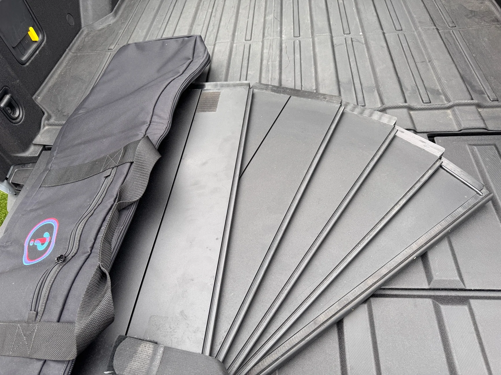 Rivian R1T R1S Interrobang tonneau cover with original storage bag IMG_8967