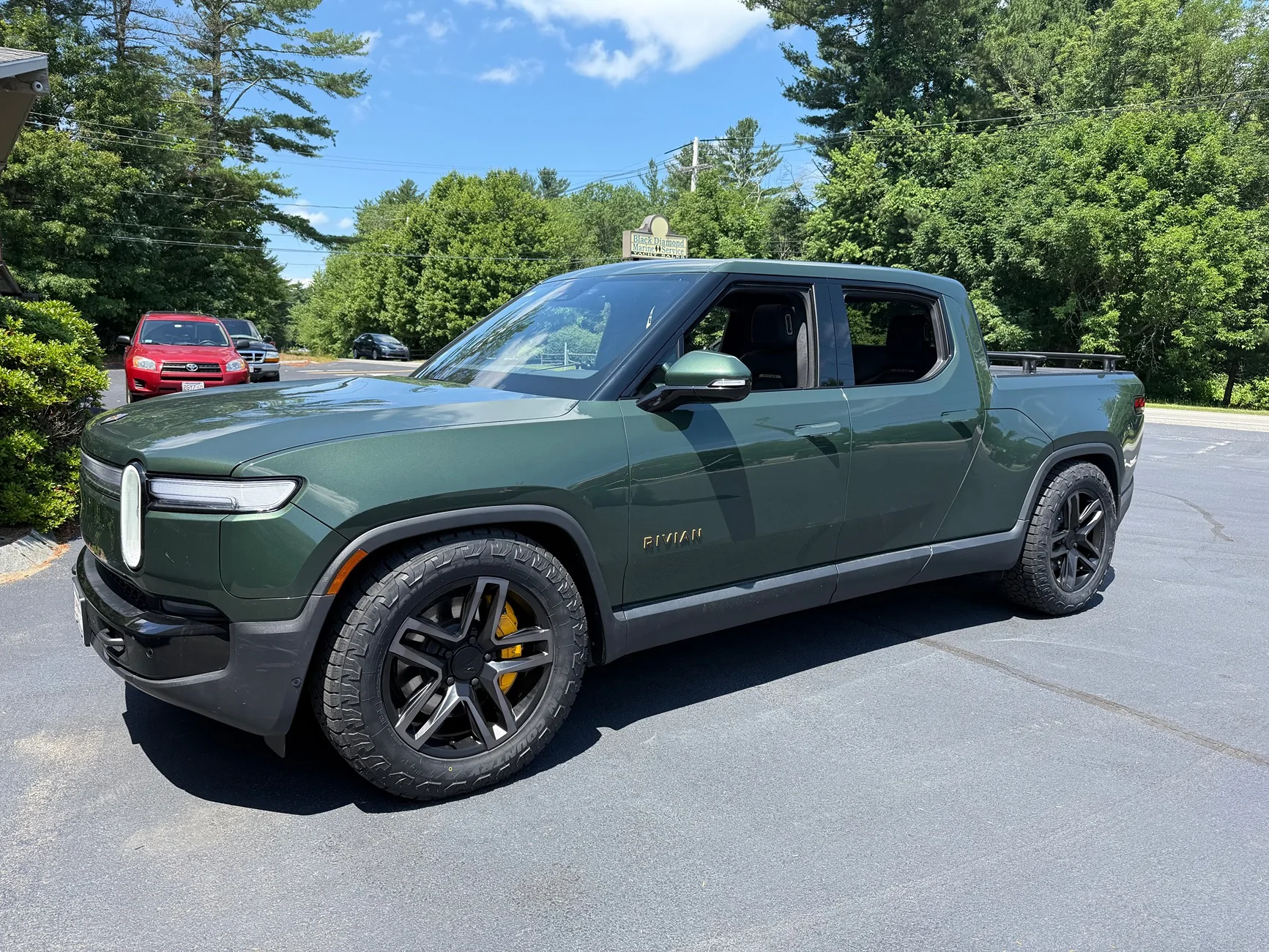 Rivian R1T R1S Looking to switch from 22s AS to 20 ATs … advice IMG_4731