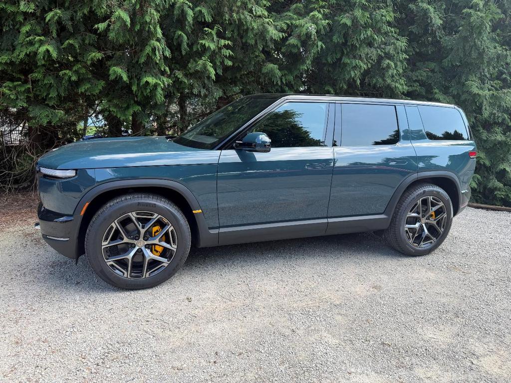 Rivian R1T R1S First R2 flip. $20K price premium added b5c7b006-65e5-4167-84ff-2689deb631fe