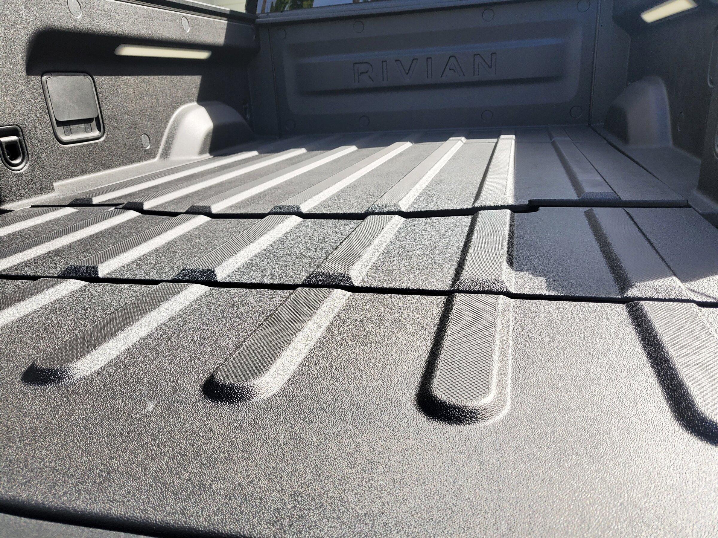 Rivian R1T R1S R1T Spare Lid doesn't latch easily on one side 20220321_145249