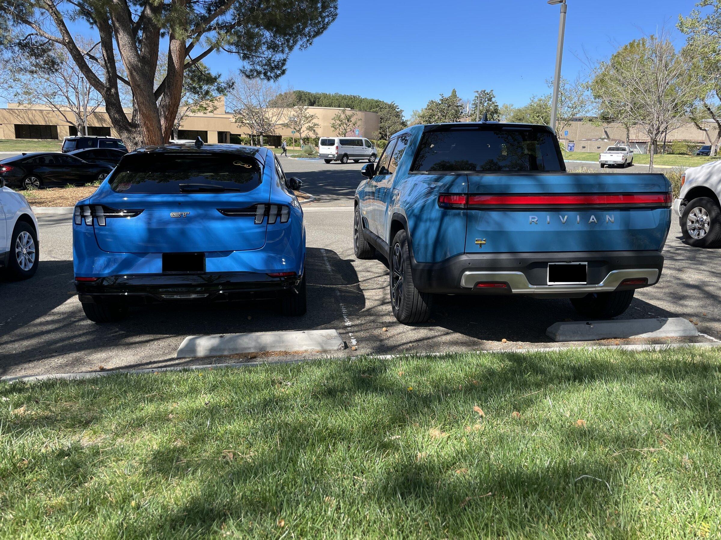 Rivian R1T R1S Rivian Blue R1T vs Grabber Blue Mach-E GT a side by side comparison look image_16903425-