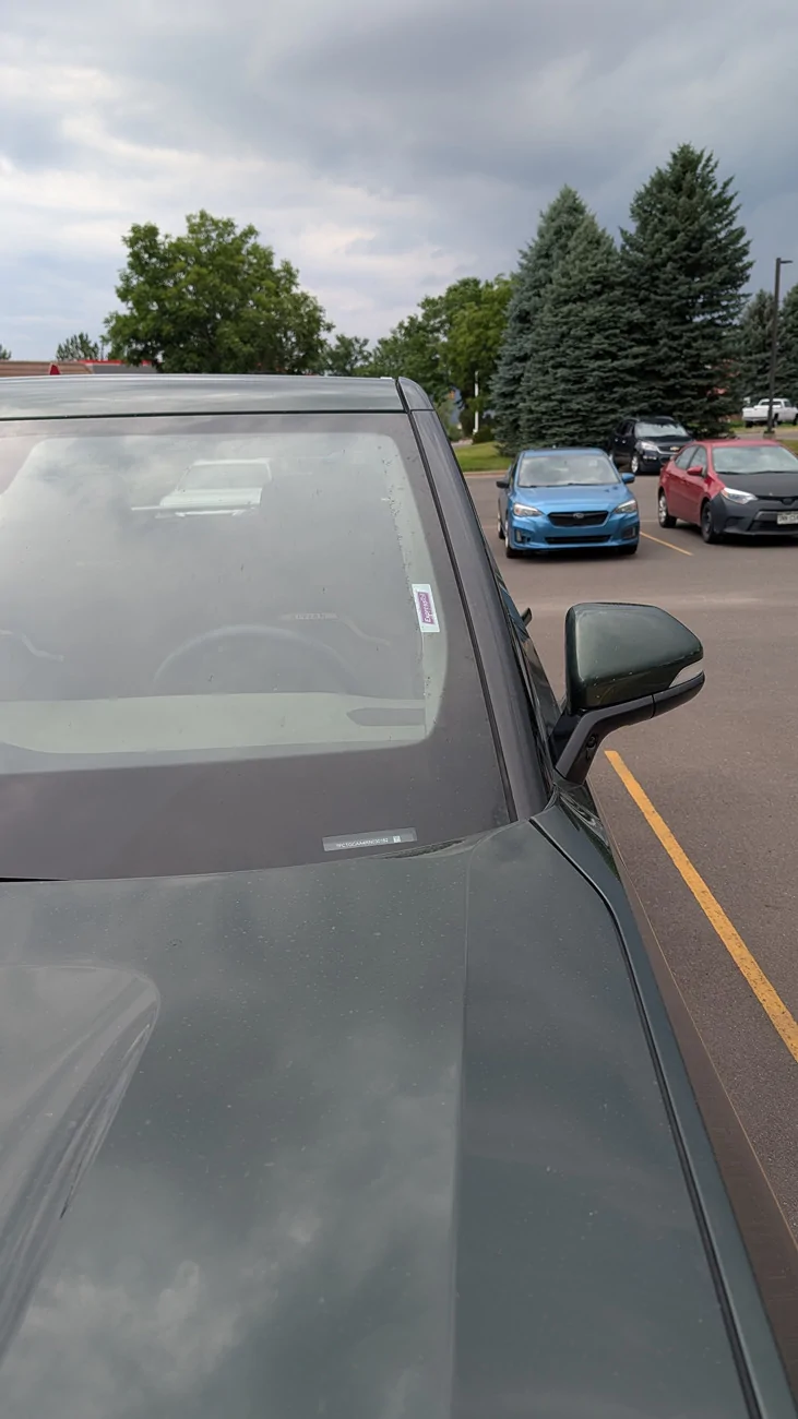 Rivian R1T R1S Colorado Express Toll sticker on R1S with Xpel tinted windshield PXL_20260727_230851338