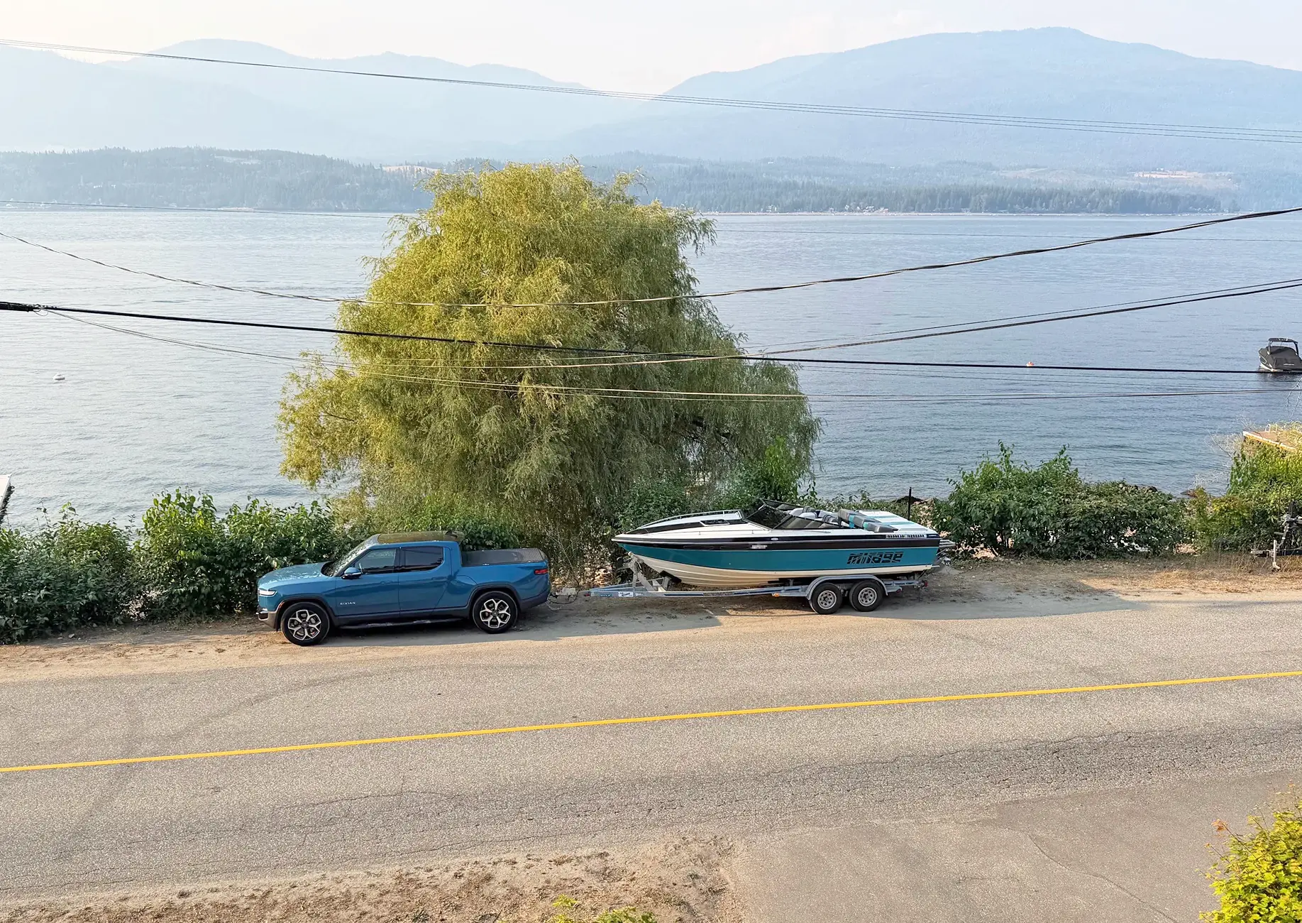 Rivian R1T R1S Conquering the Coquihalla, Towing 6000# Trailer & Boat, Elevation gain: 3950' 2nd leg, 2780' 3rd leg, No issues - range surprisingly good. 161503-a2c7448ec6d8ce0cd1b2873bd3d7e347 (1)