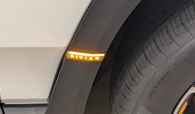 Rivian R1T R1S R2 front side marker RIVIAN badge just tape? Screenshot 2026-08-17 174756