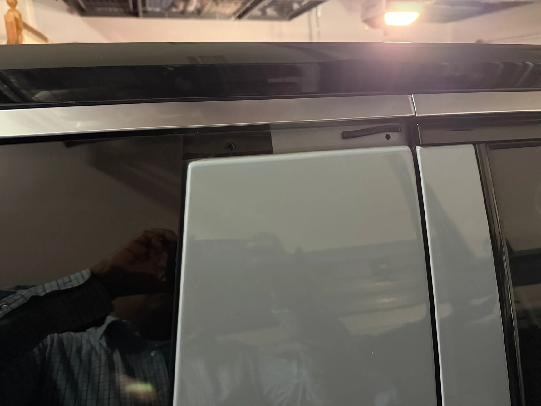 Rivian R1T R1S Small molding fell off - warranty coverage? IMG_2338